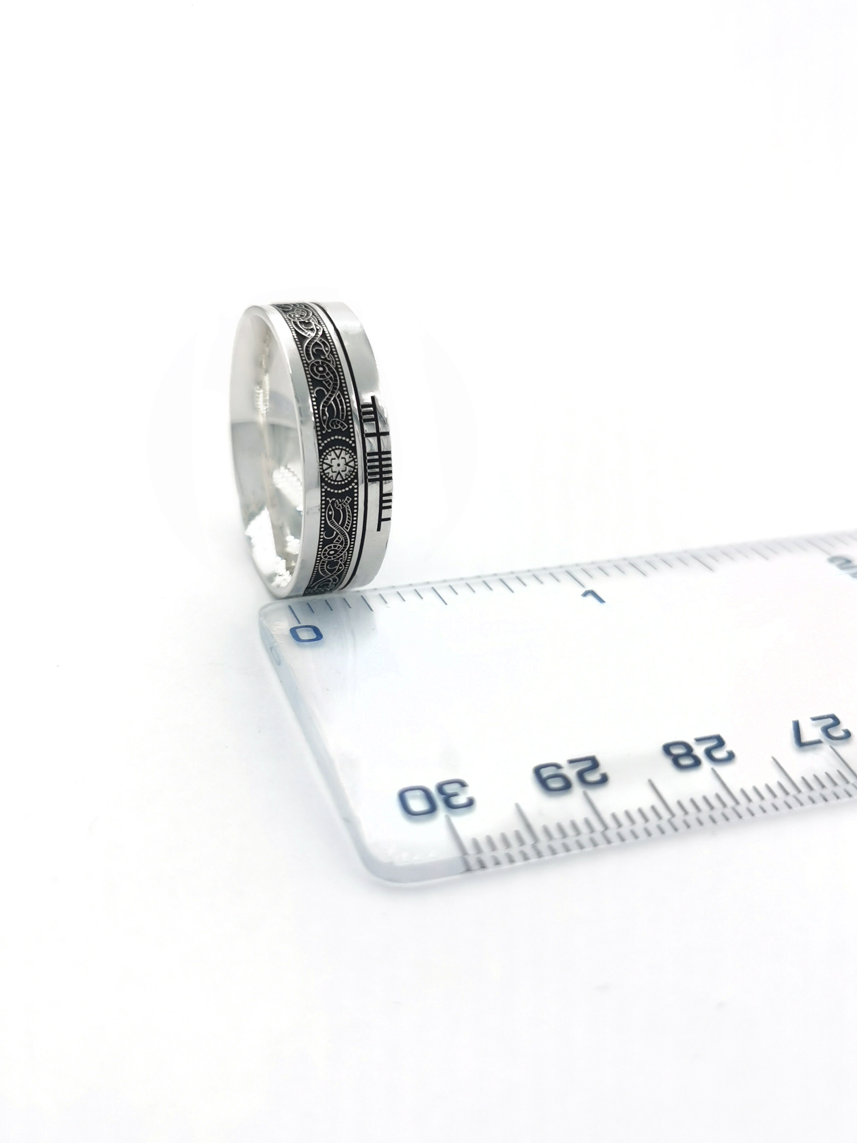 Customizable Sterling Silver Ogham & Celtic Warrior Engravable Ring With a Oxidized Finish. Picture For Scale.