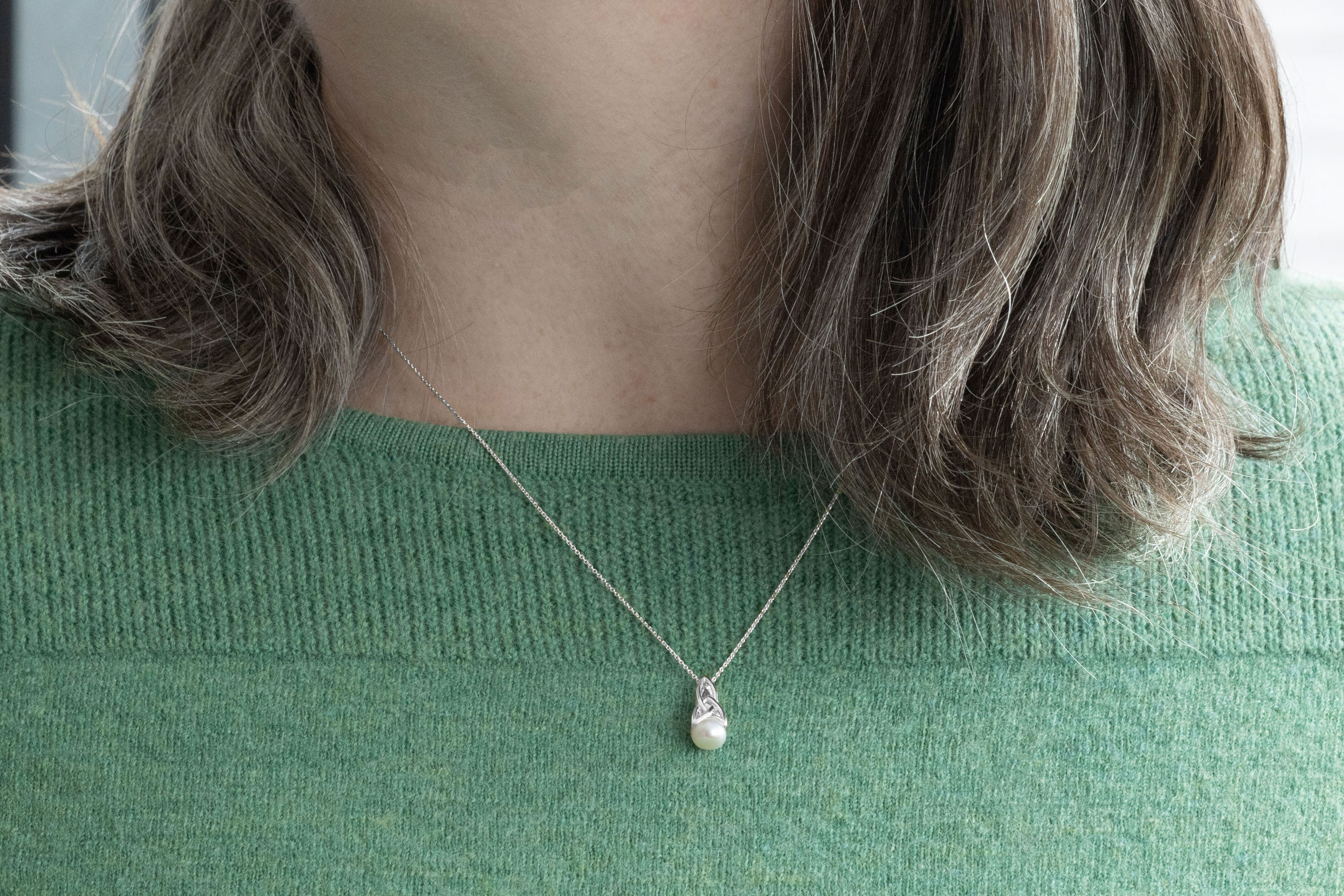 Irish Sterling Silver Trinity Knot Necklace For Women - Model Photo