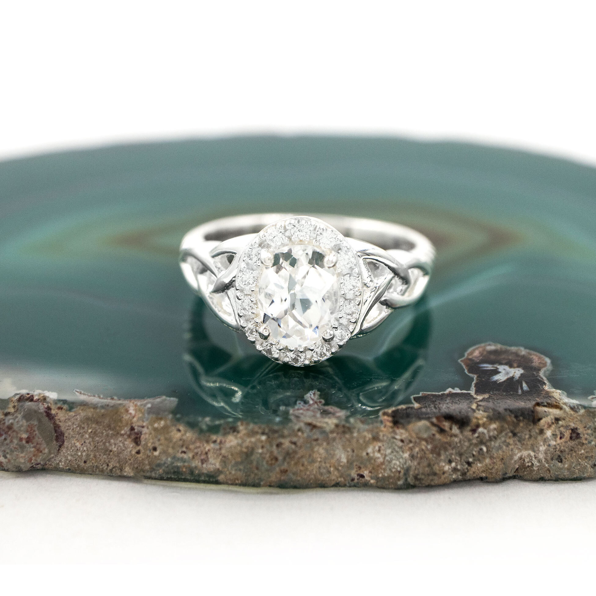 White Topaz Halo Trinity Ring