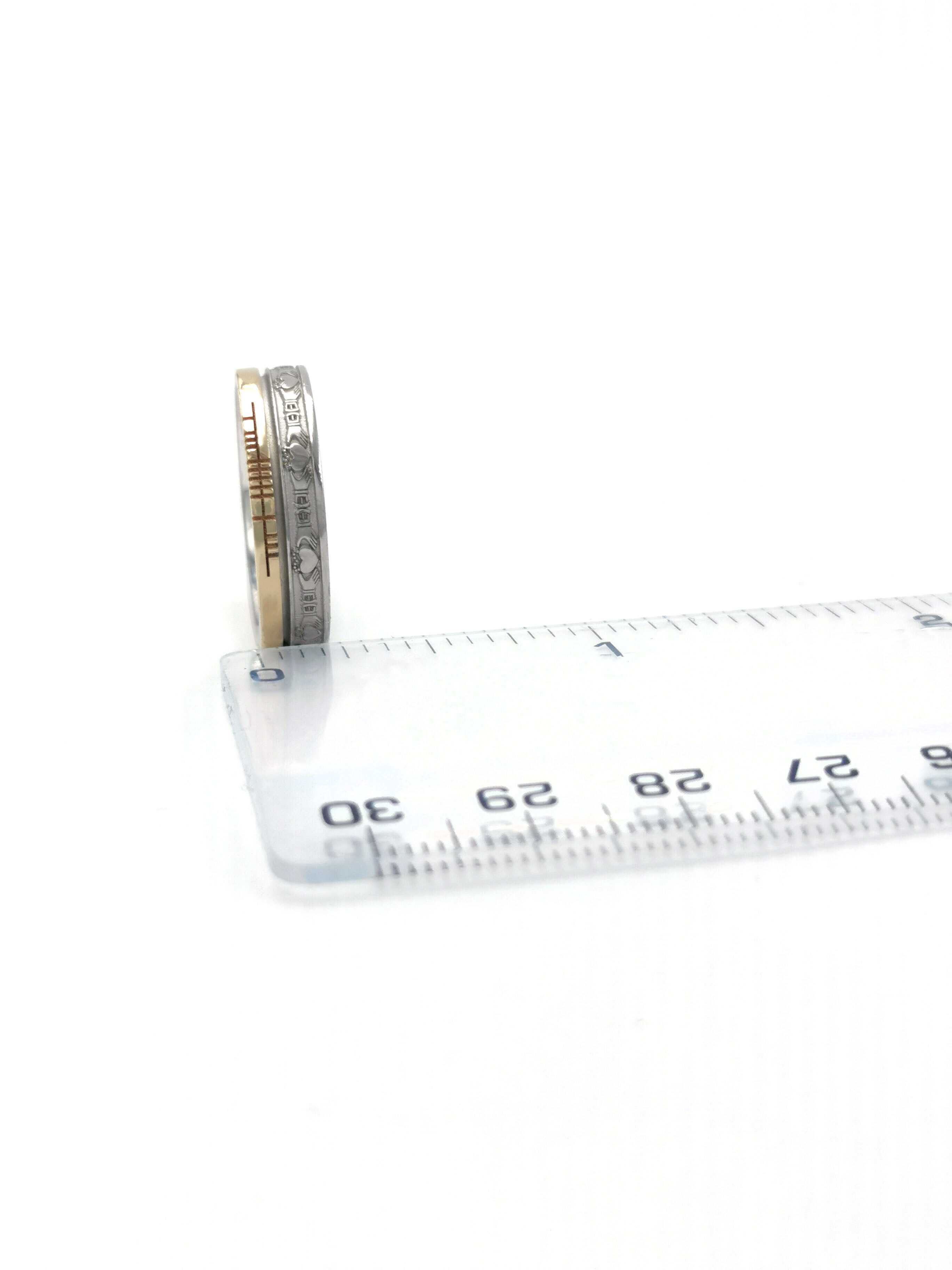 Striking White Gold & Yellow Gold Ogham 7.3mm Ring With a Florentine Finish. Picture For Scale.