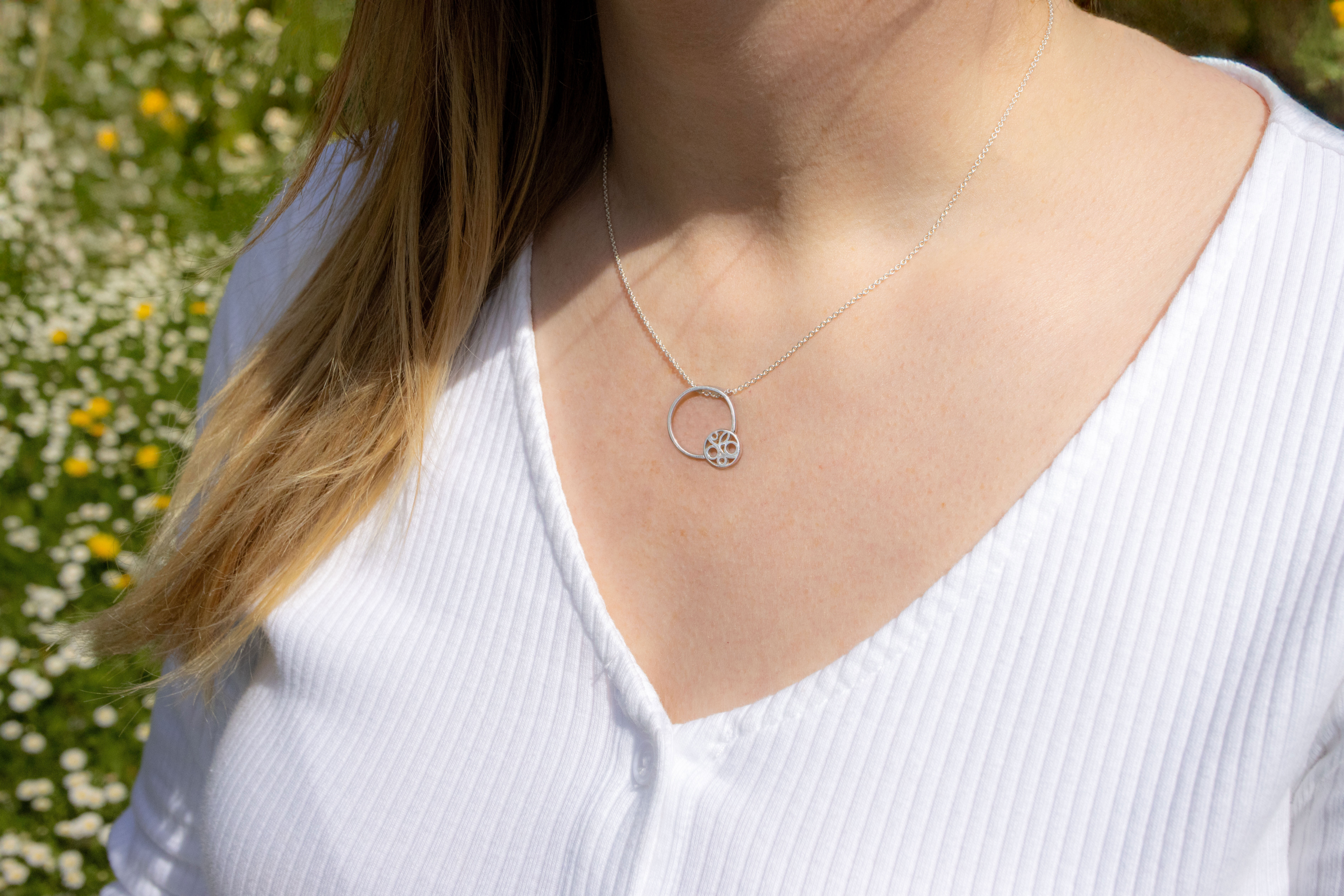 Real Sterling Silver Folklore & Newgrange Necklace For Women - Model Photo