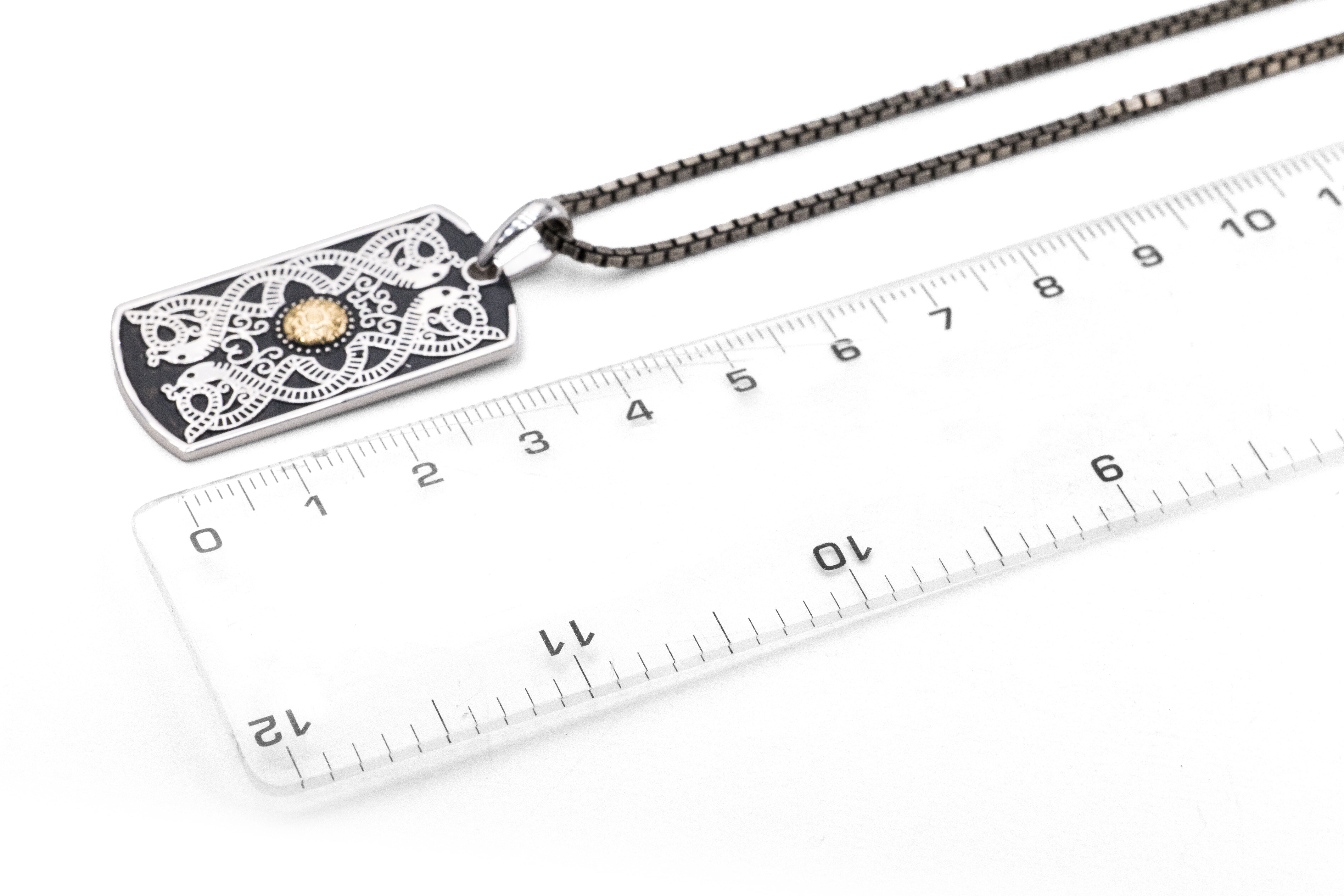 Genuine Sterling Silver & 18K Yellow Gold Celtic Warrior Necklace With a Oxidised Finish For Men. Picture For Scale.