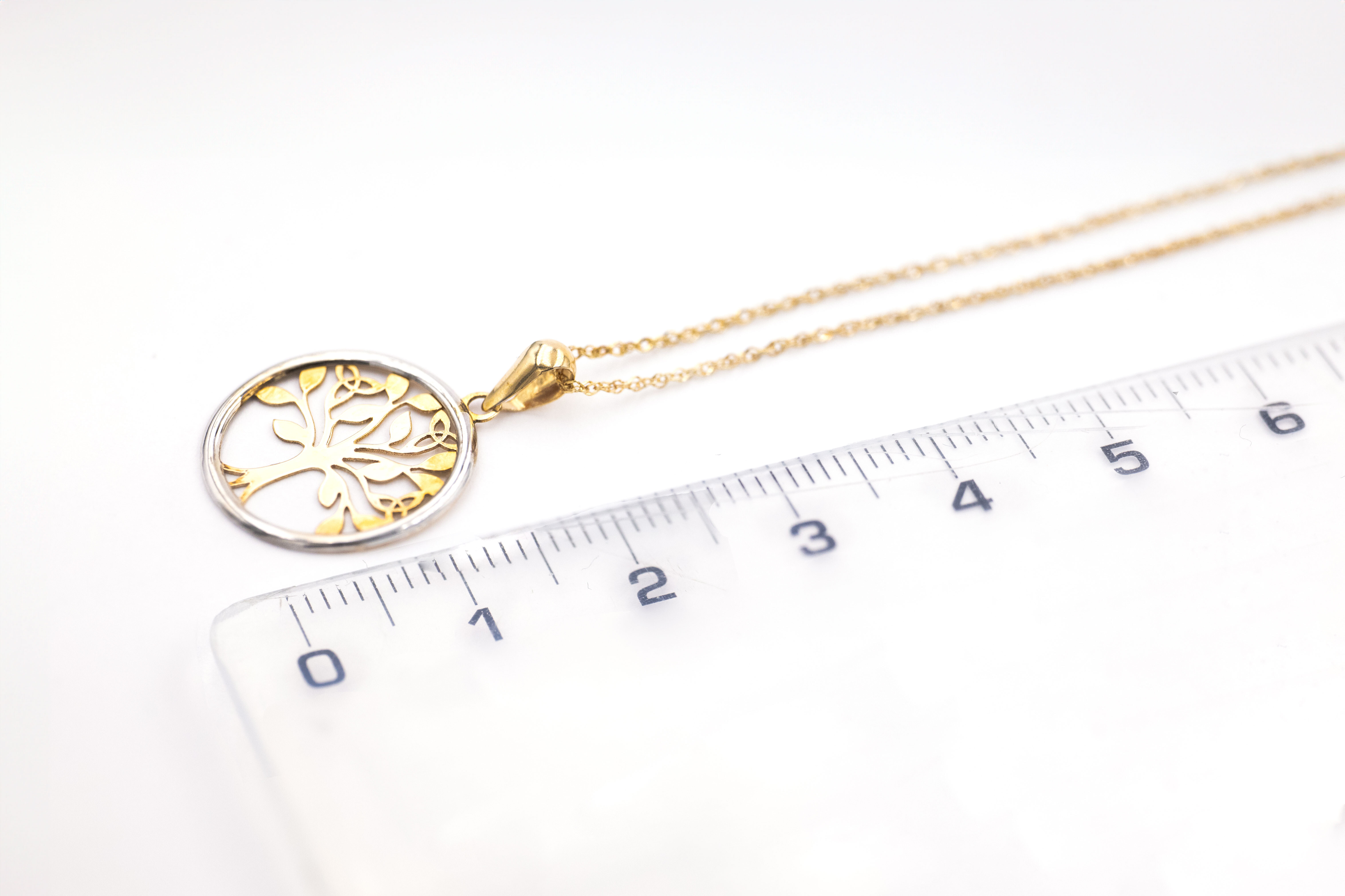 Attractive Yellow Gold & White Gold Tree of Life Necklace For Women With a Polished Finish. Picture For Scale.