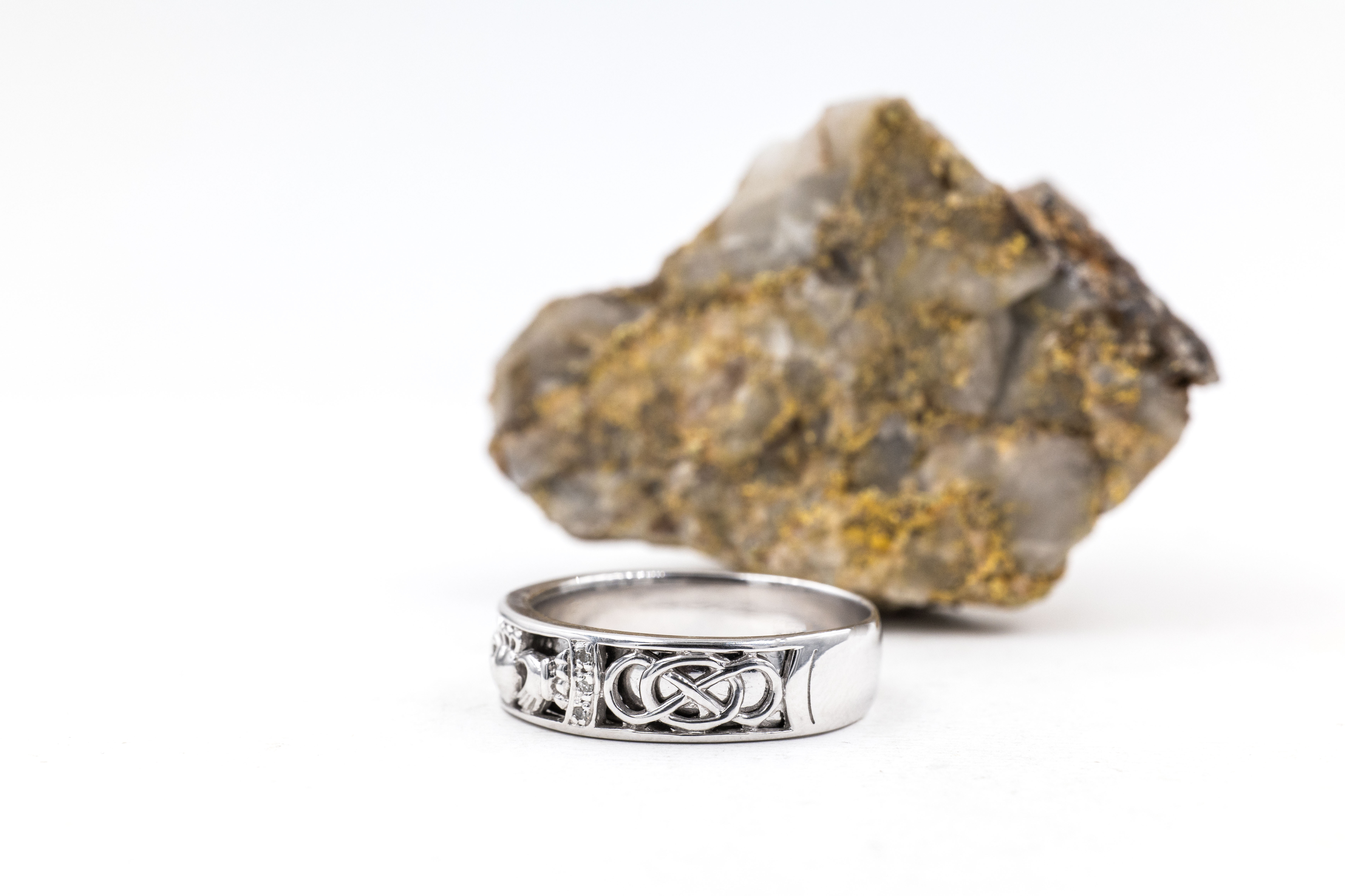 Mens Striking White Gold Claddagh 5.0mm Ring. Side View.