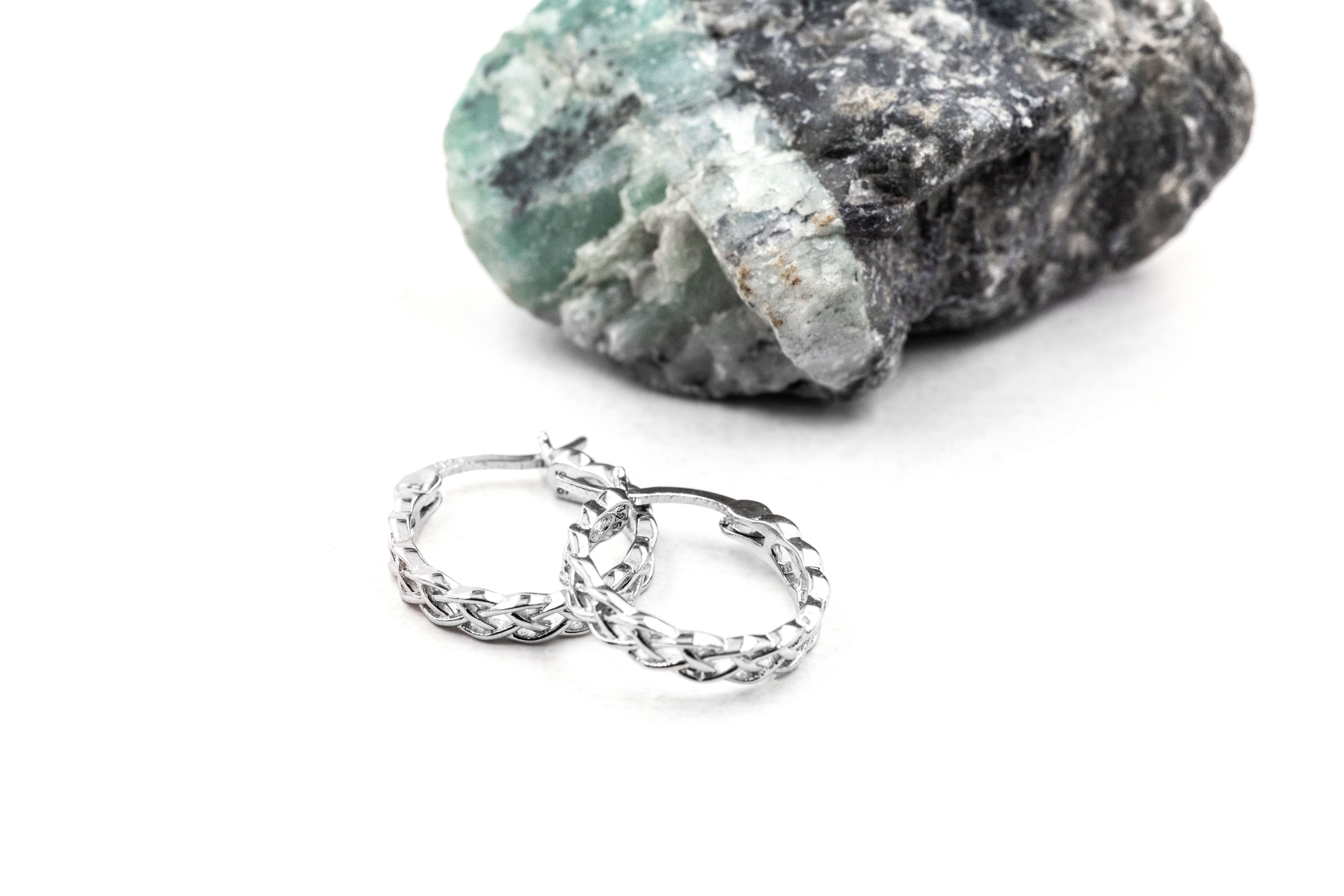 Genuine Sterling Silver Celtic Knot Earrings With a Polished Finish For Women. Side View.