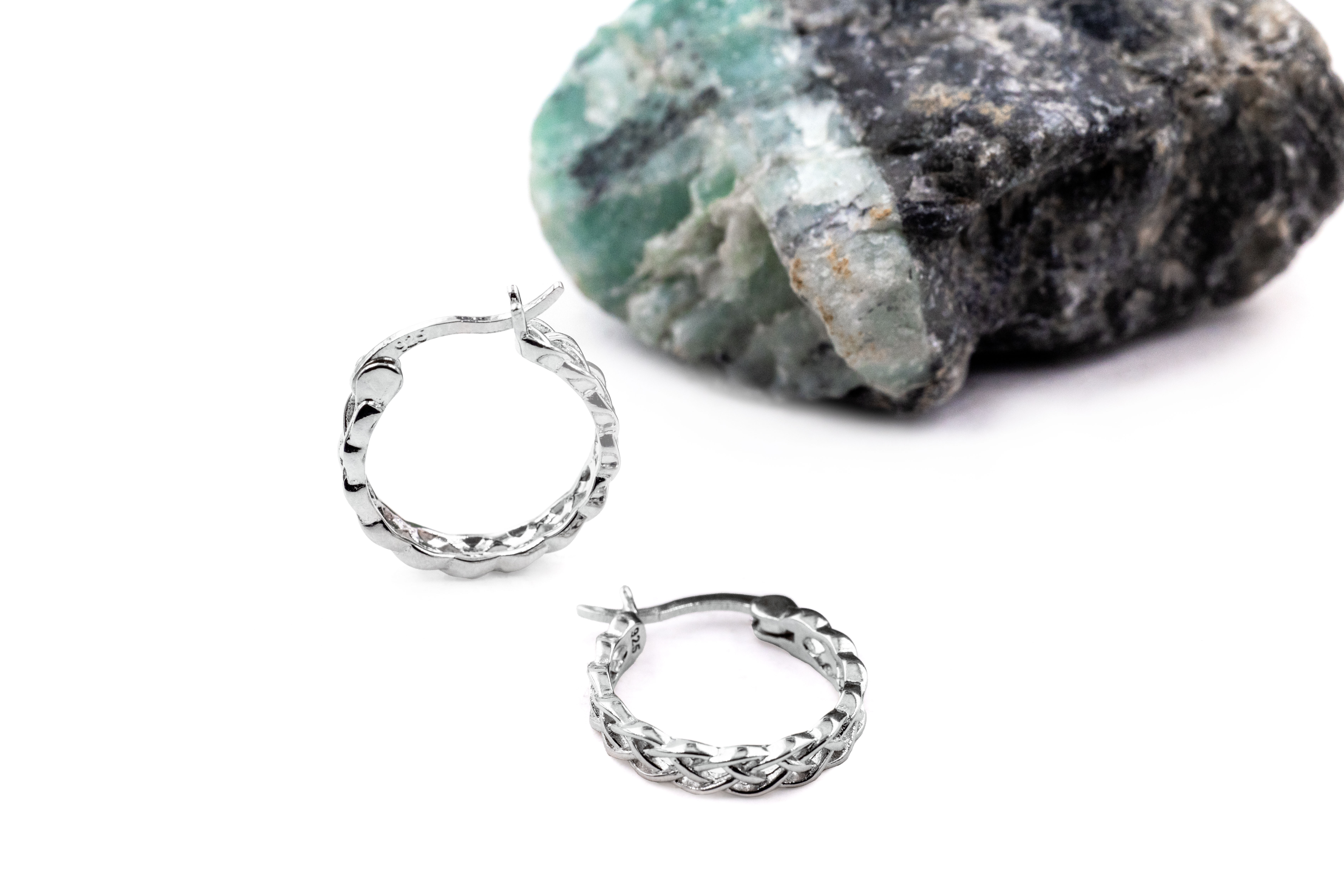 Womens Small Polished Sterling Silver Celtic Knot Earrings. Side View.