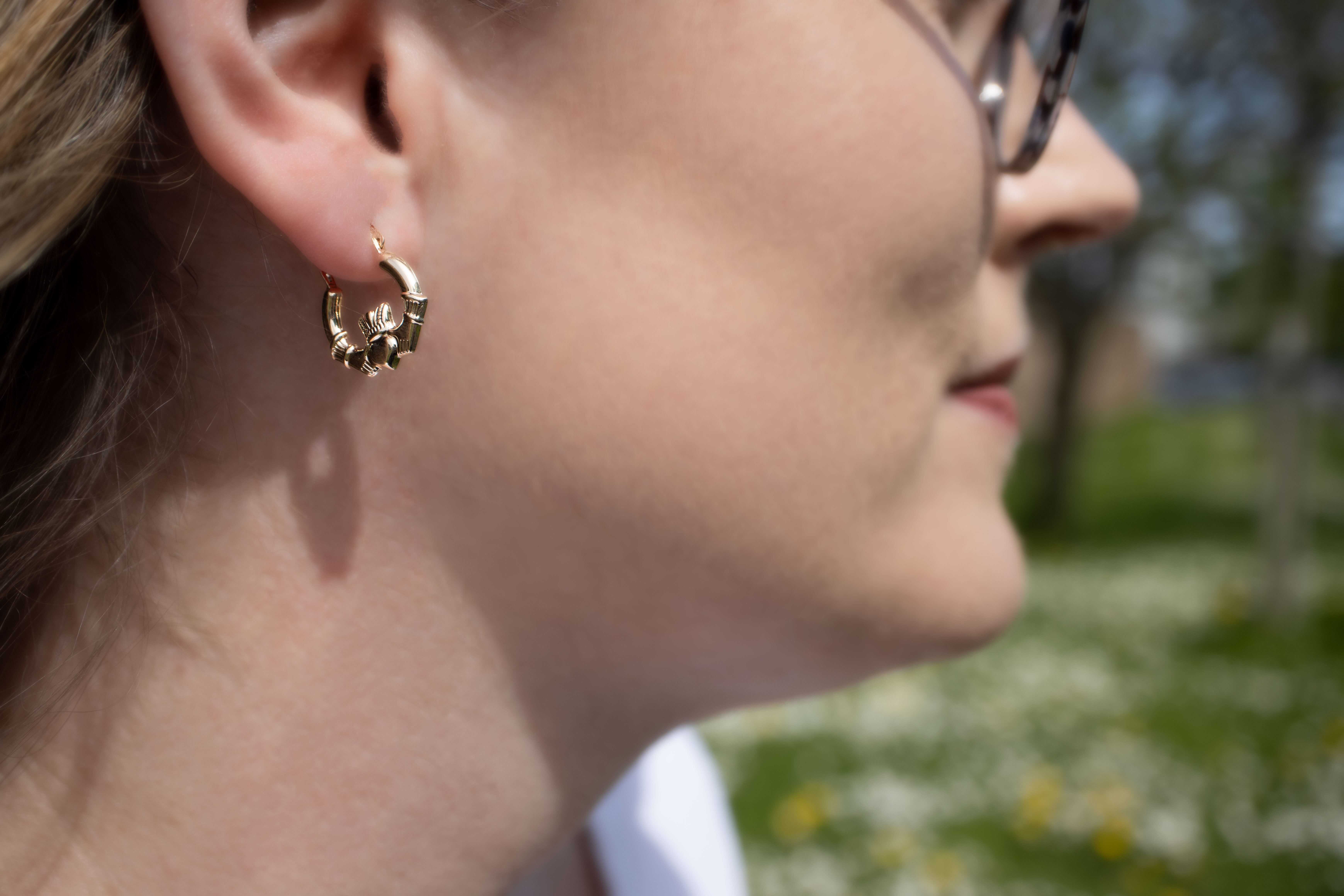 Small Womens Real Polished 14K Yellow Gold Claddagh Earrings - Model Photo