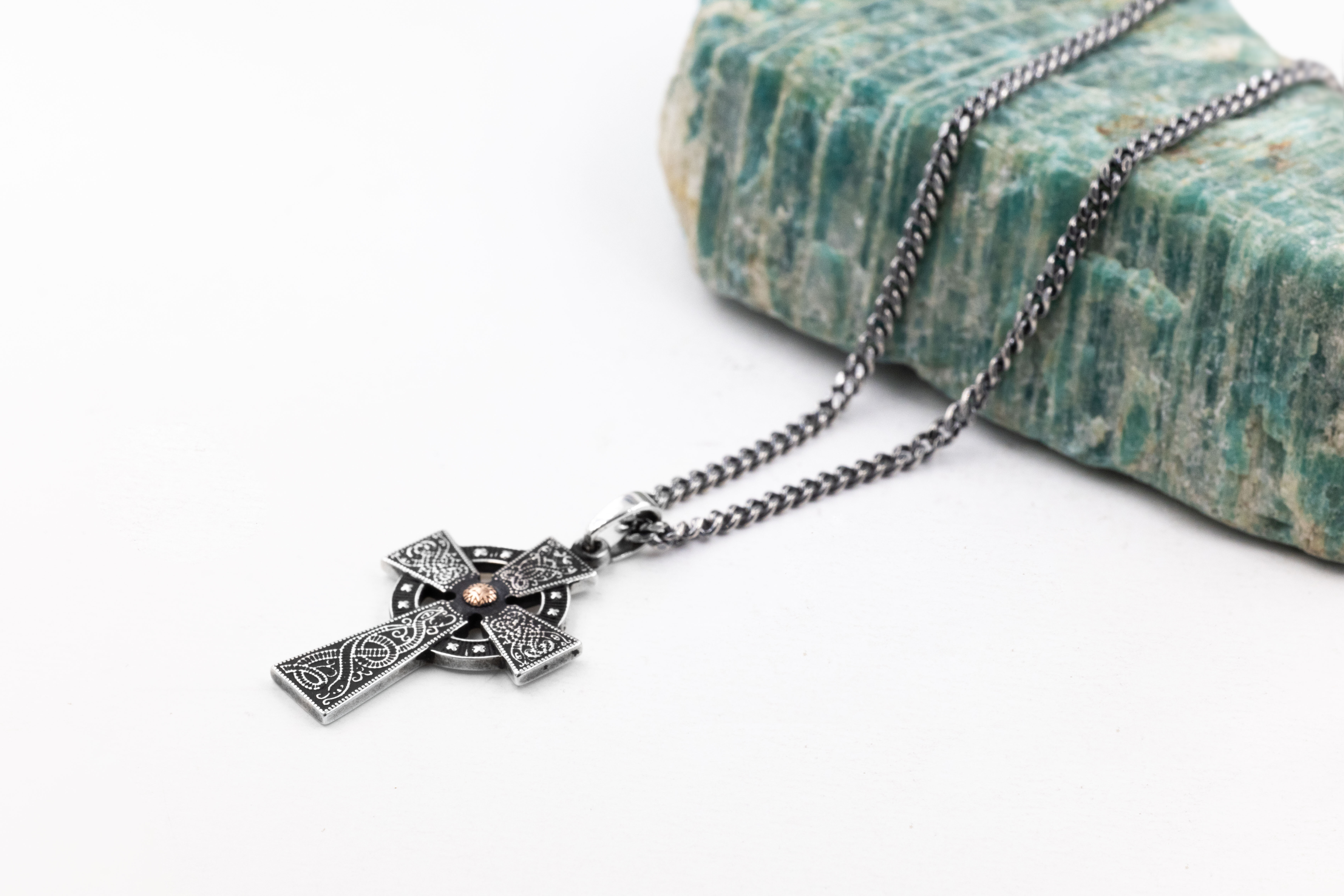 Womens Celtic Cross & Celtic Warrior Necklace in Sterling Silver & Rose Gold With a Oxidised Finish. Pictured Flat.