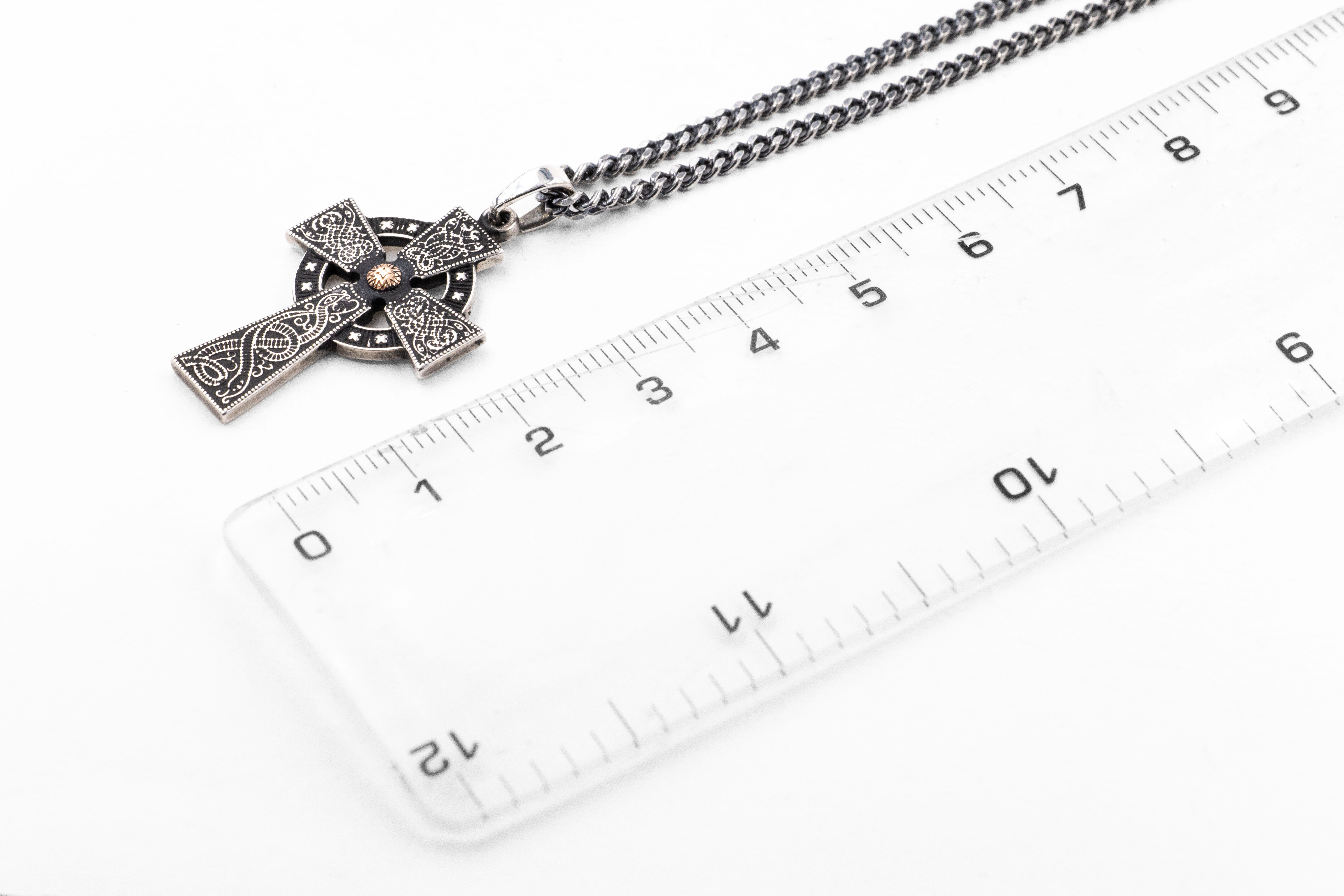 Gorgeous Sterling Silver & Rose Gold Celtic Cross & Celtic Warrior Necklace For Women With a Oxidised Finish. Picture For Scale.