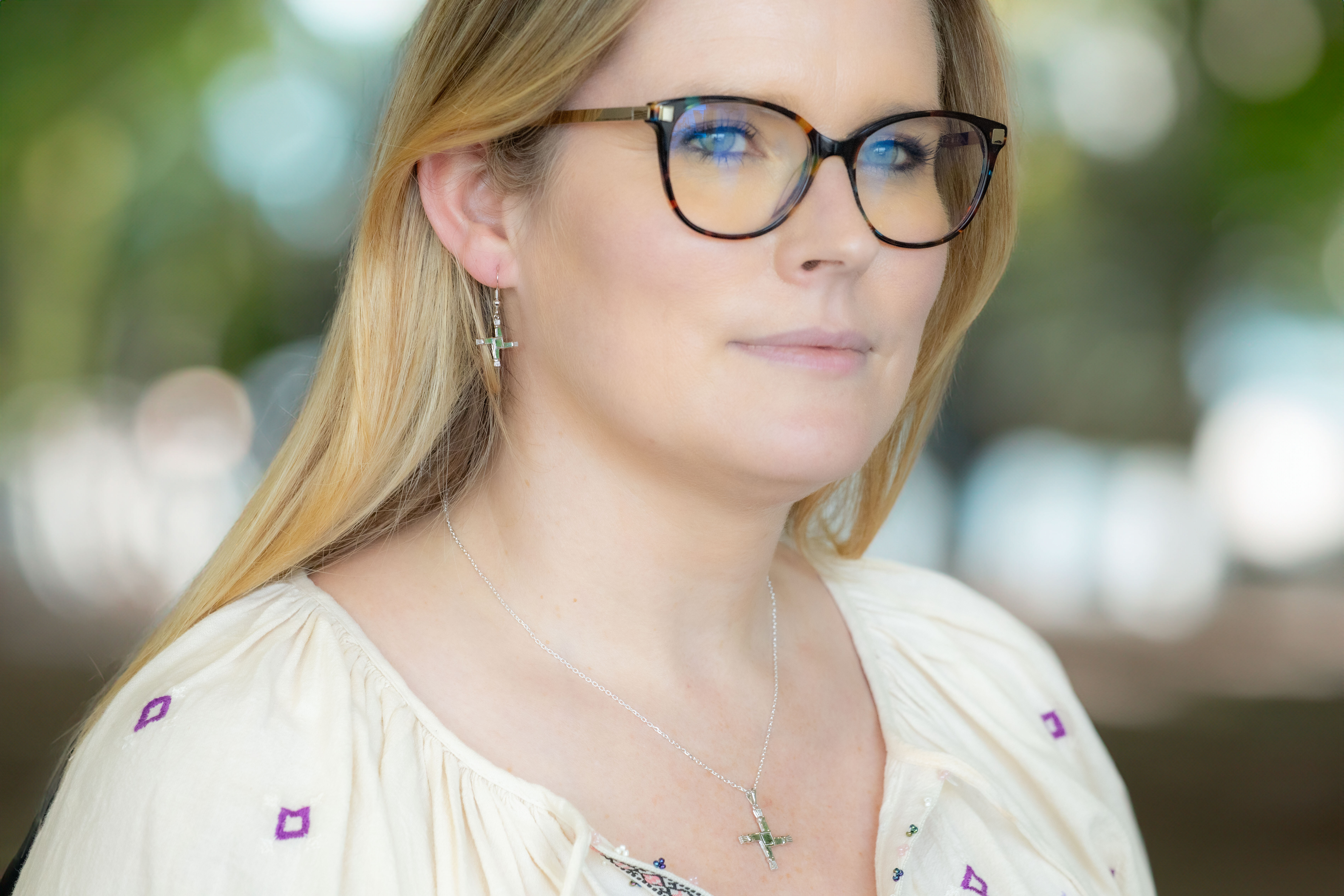 Gorgeous Sterling Silver St Brigids Cross & Connemara Marble Gift Set For Women With a Polished Finish - Model Photo