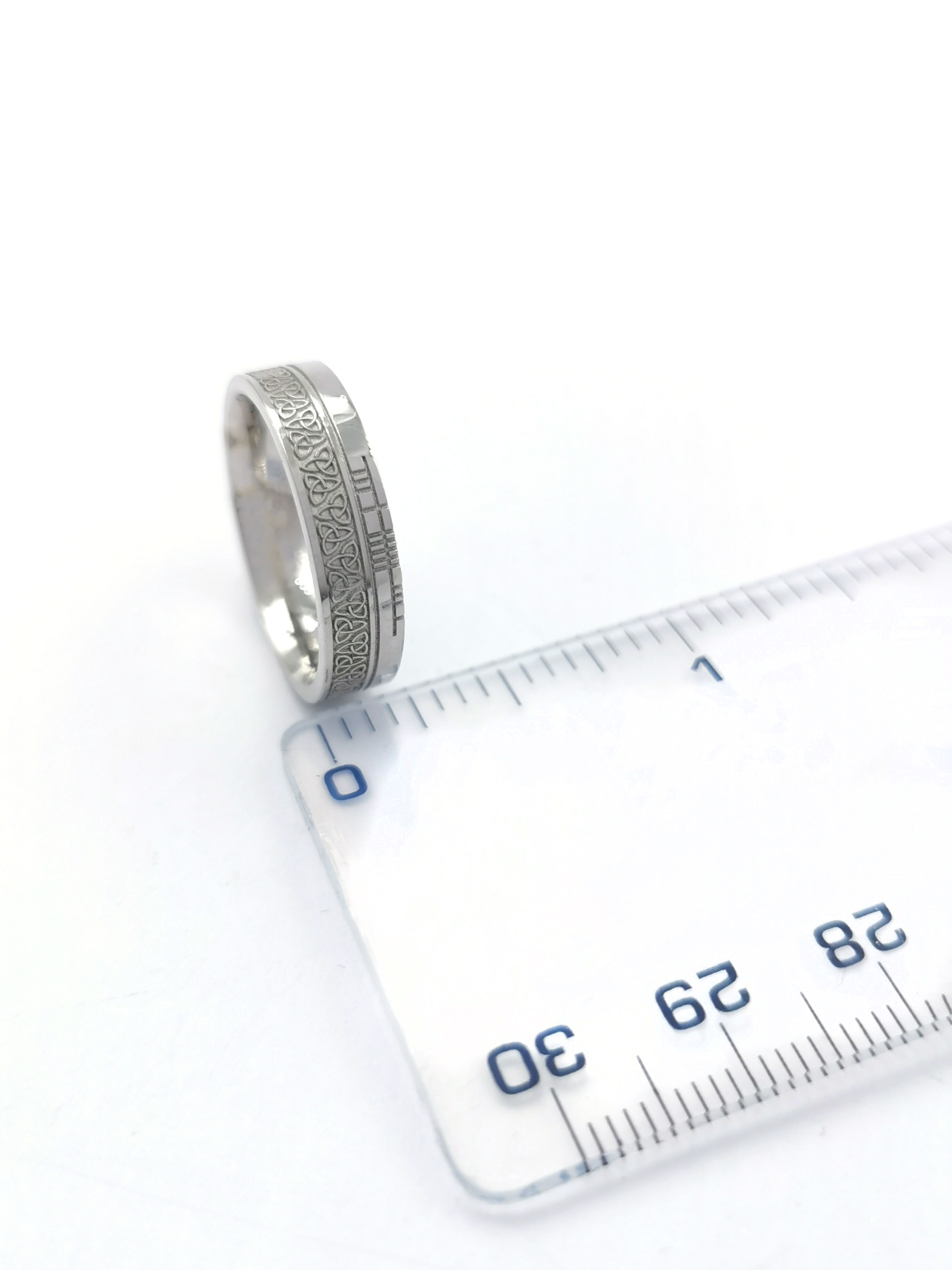 Florentine Platinum 950 Ogham & Trinity Knot 7.3mm Ring. Picture For Scale.