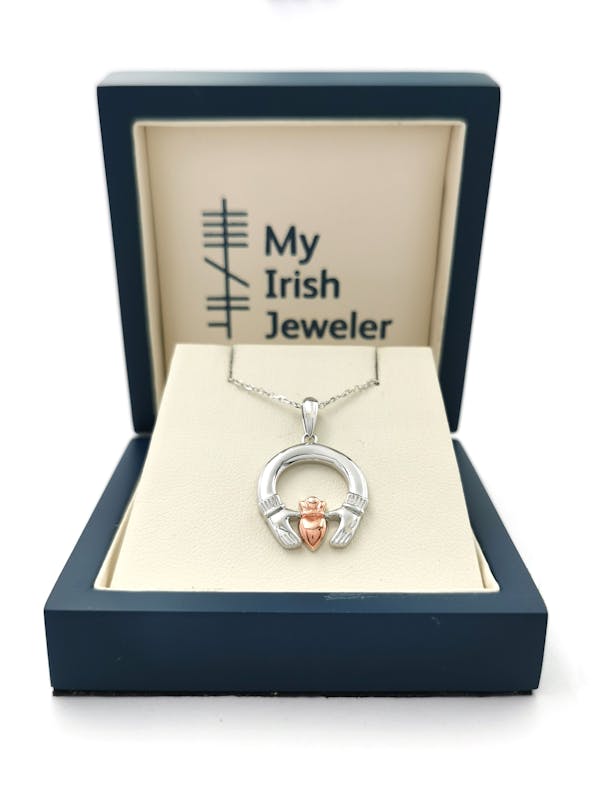 Striking Sterling Silver & Rose Gold Claddagh Necklace For Women