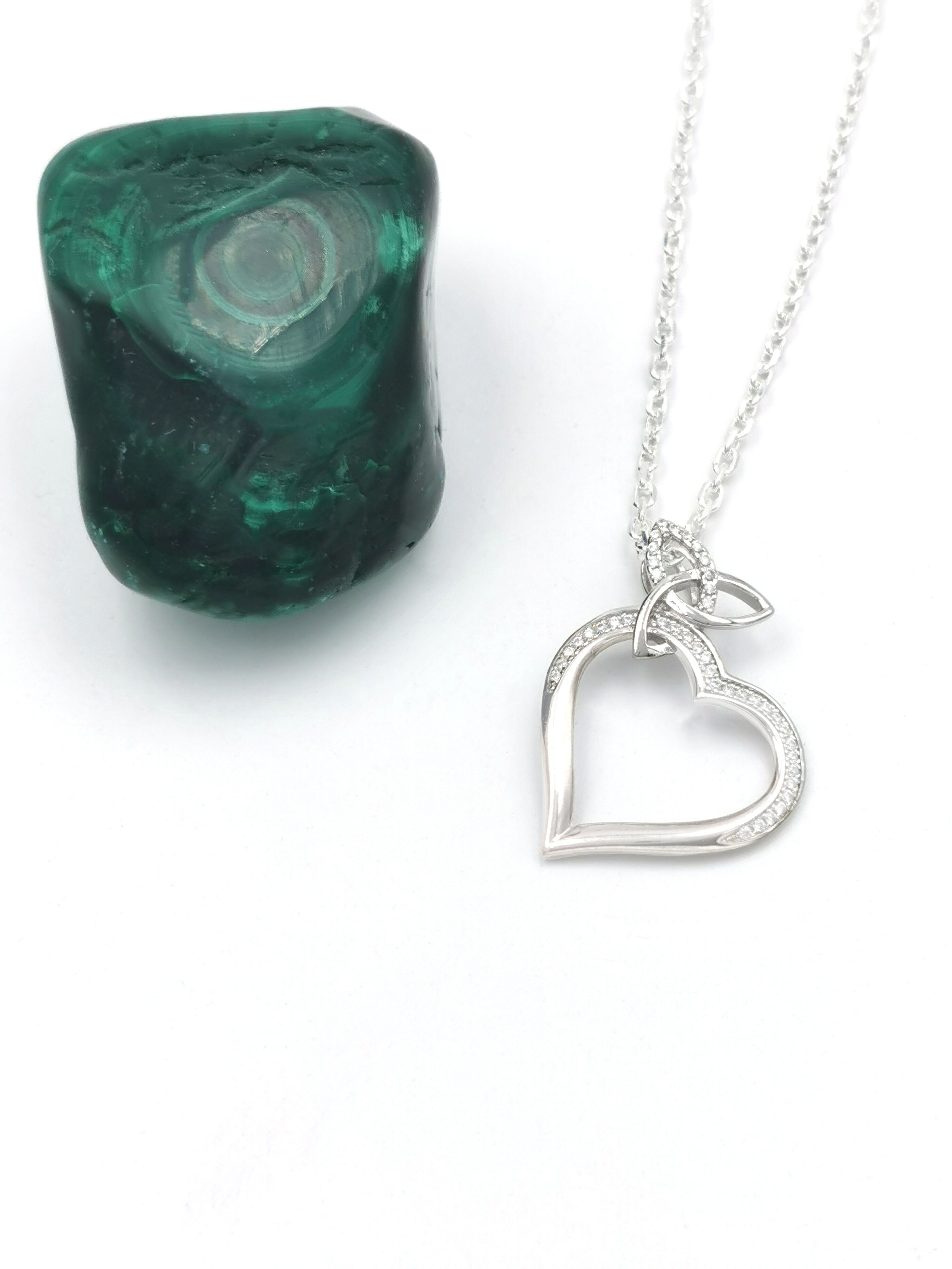 Attractive Sterling Silver Trinity Knot Necklace For Women. Pictured Flat.
