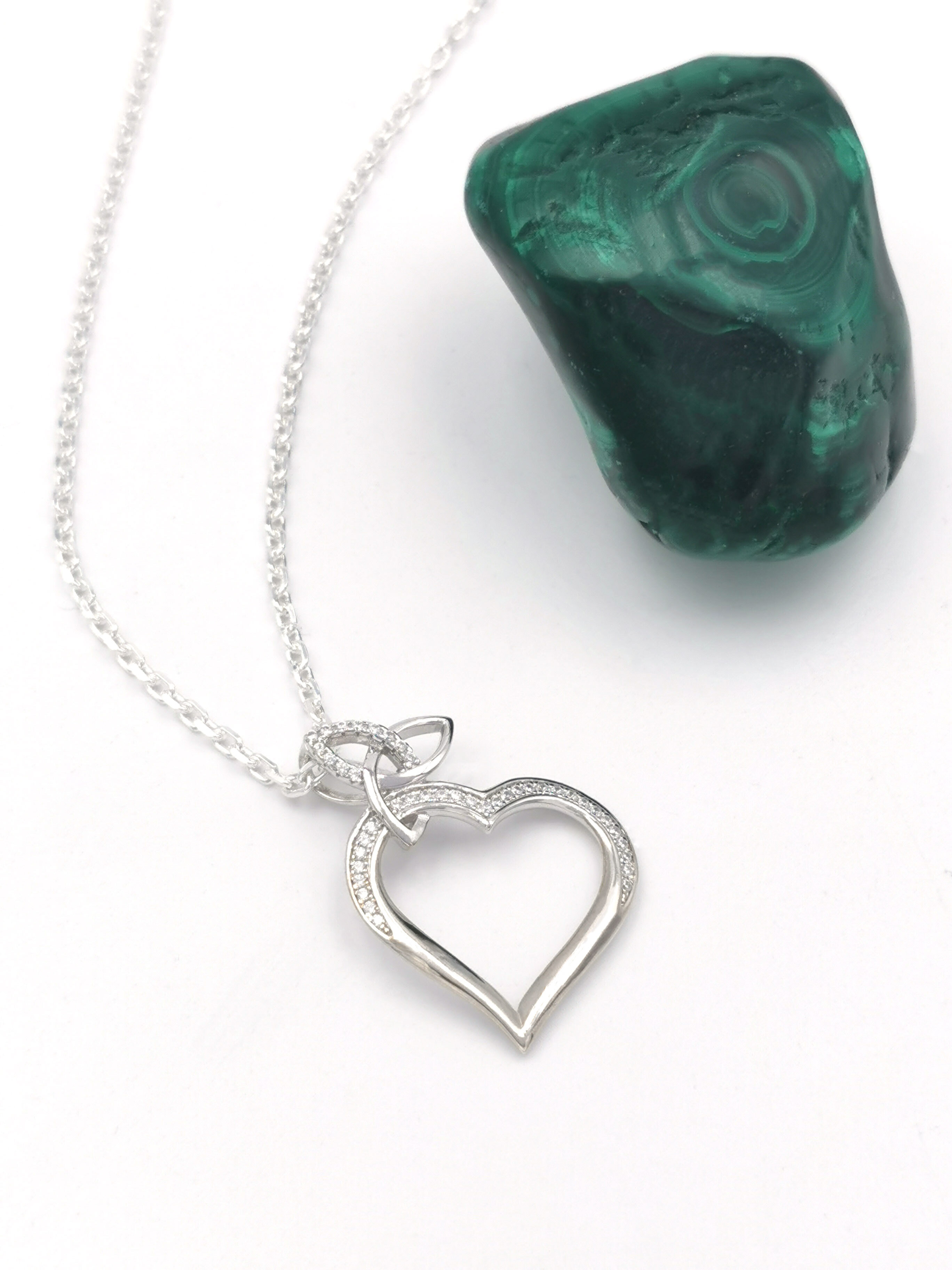 Womens Sterling Silver Trinity Knot Necklace. Pictured Flat.