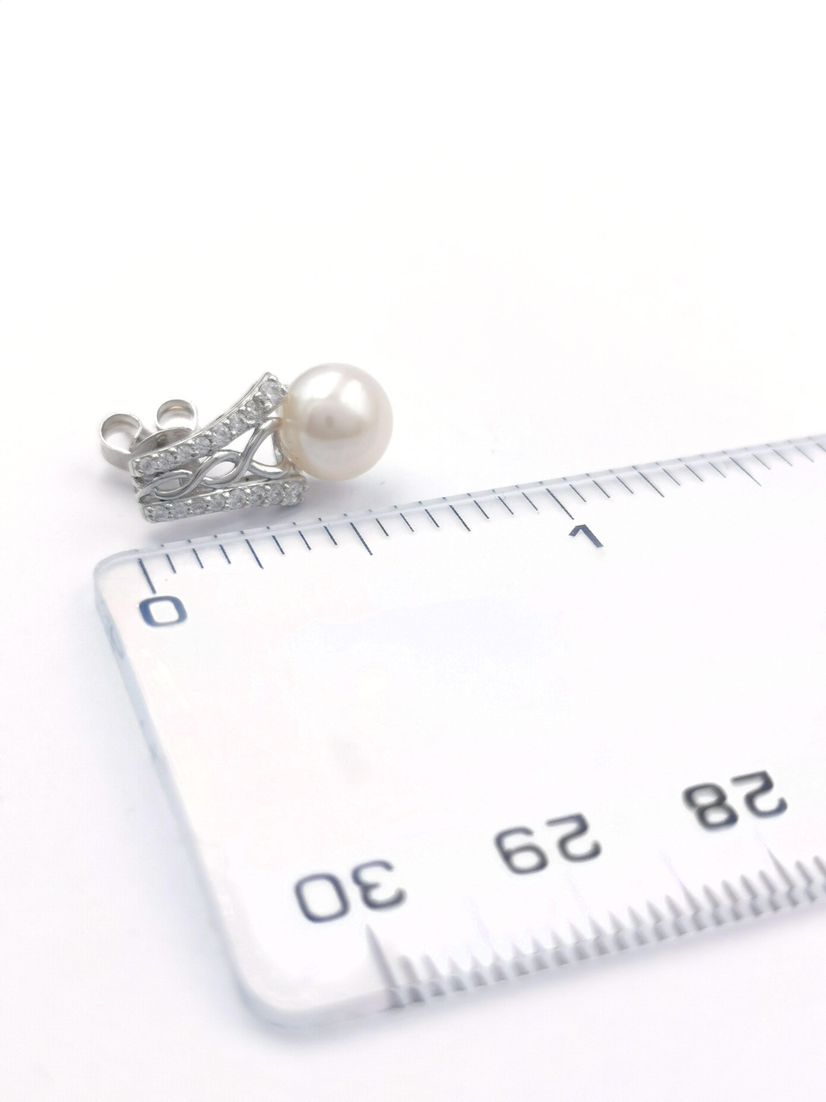 Genuine Sterling Silver Celtic Knot Earrings For Women. Picture For Scale.