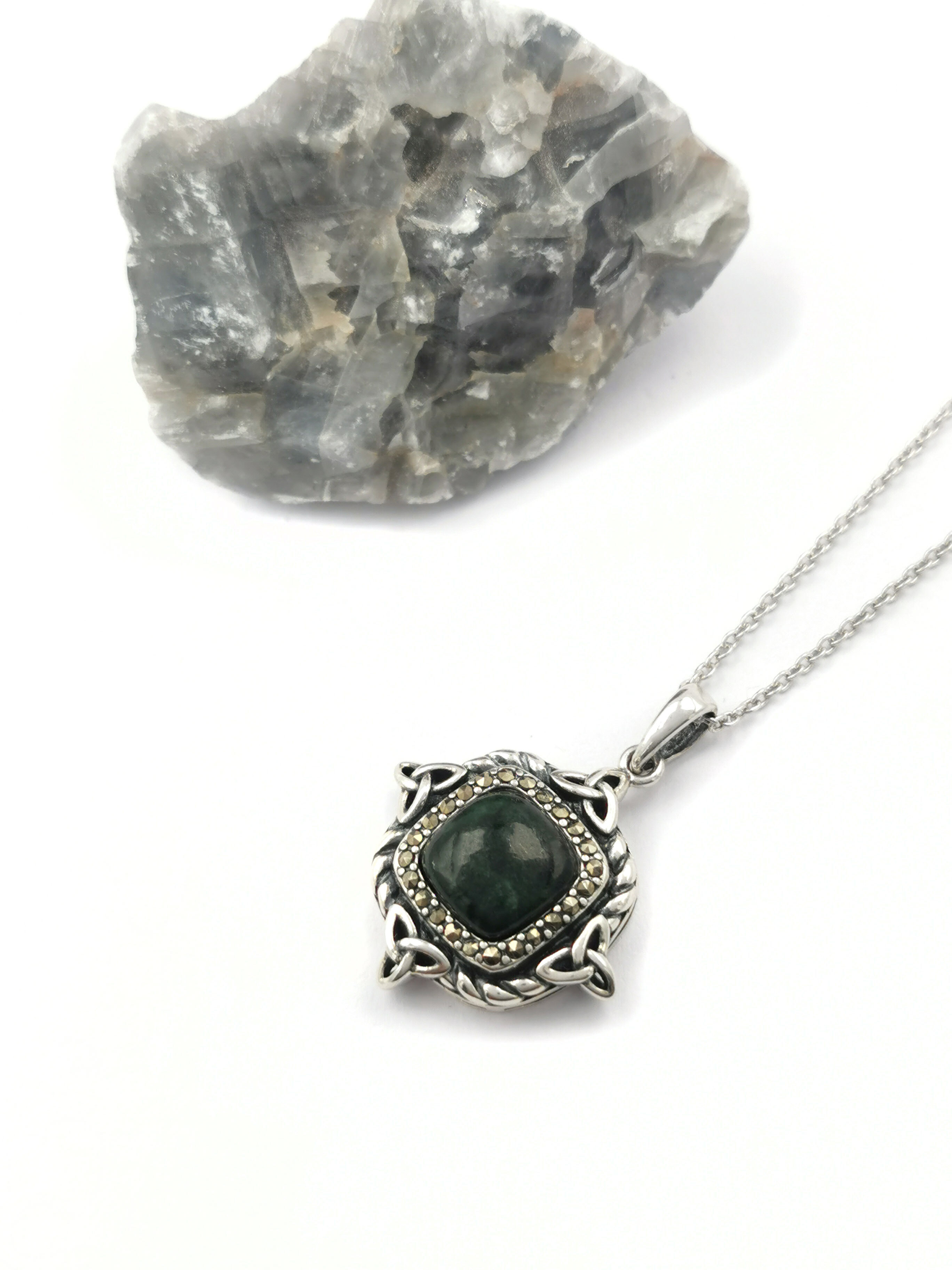 Irish Sterling Silver Trinity Knot & Connemara Marble Necklace For Women. Pictured Flat.
