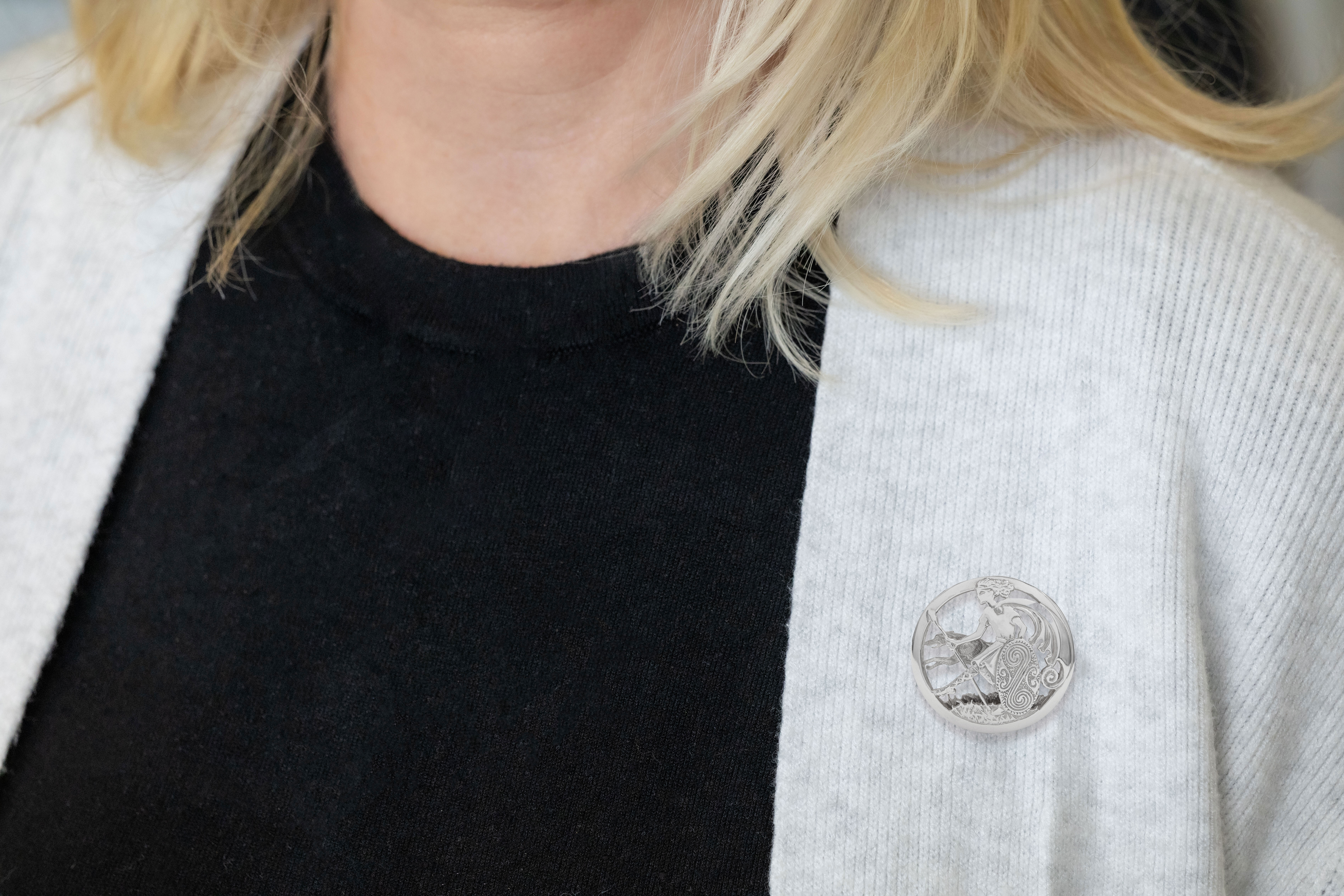 Irish Polished Sterling Silver Folklore Brooch - Model Photo