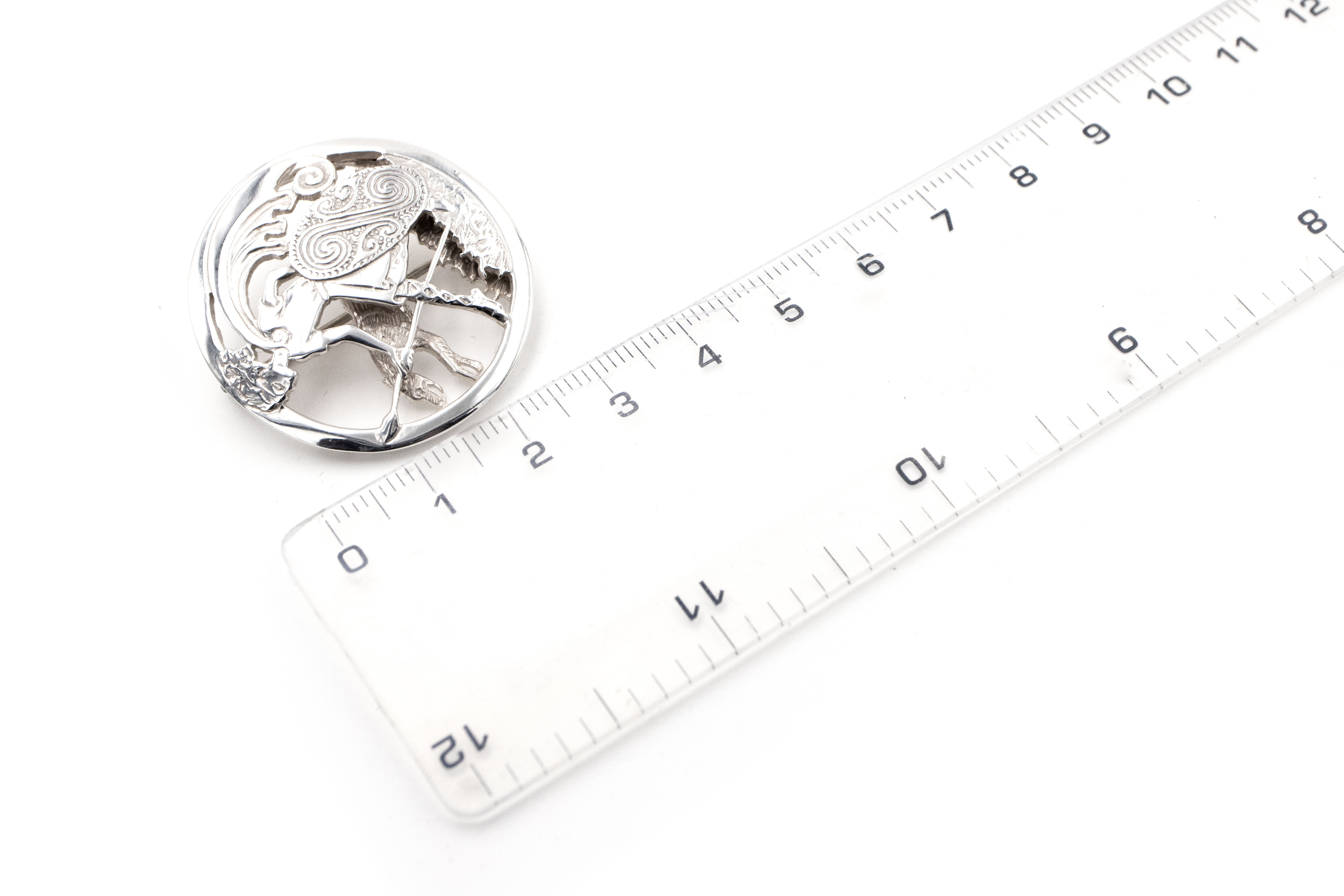 Attractive Sterling Silver Folklore Brooch With a Polished Finish. Picture For Scale.