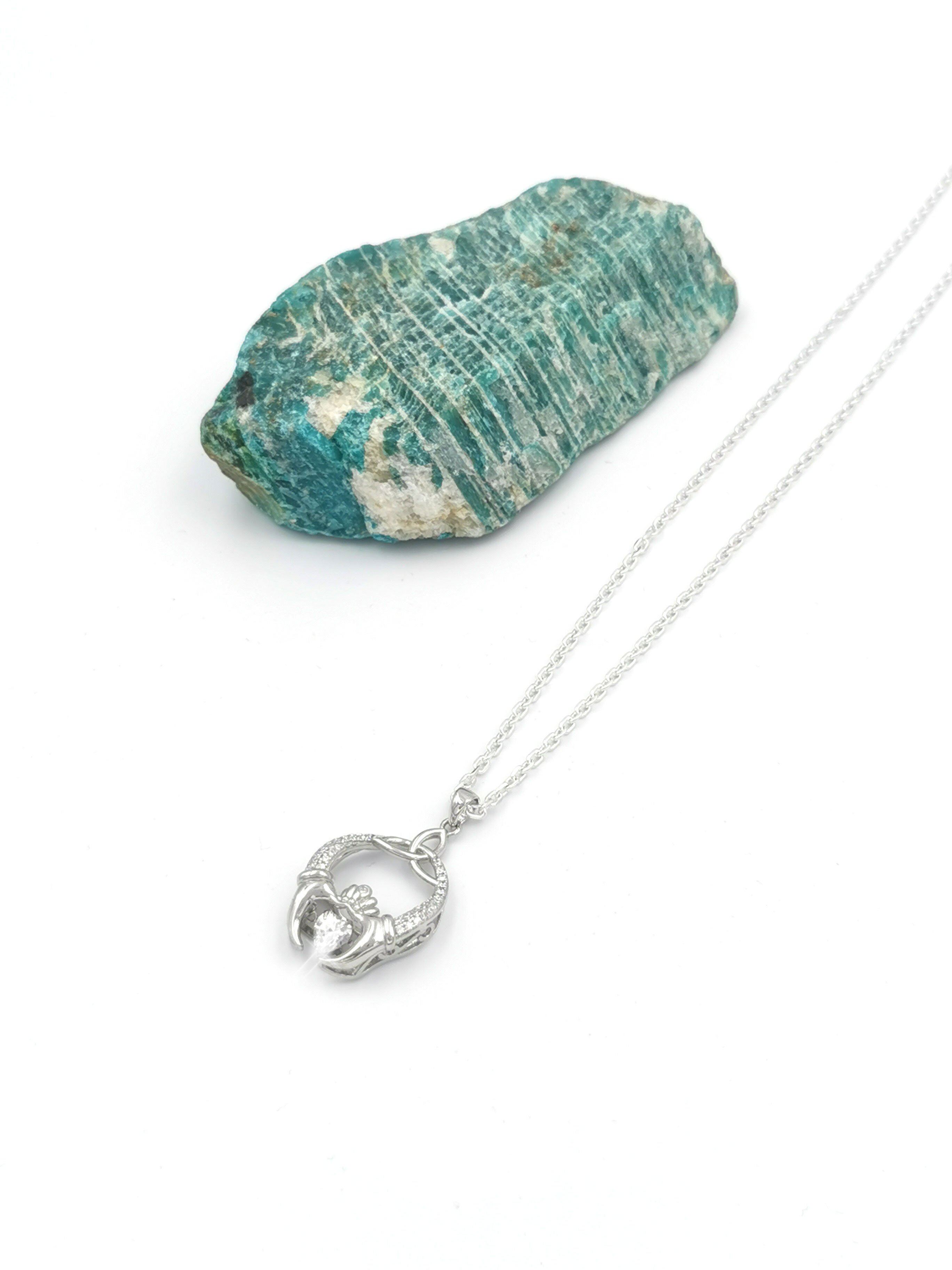 Irish Sterling Silver Claddagh Necklace For Women. Pictured Flat.