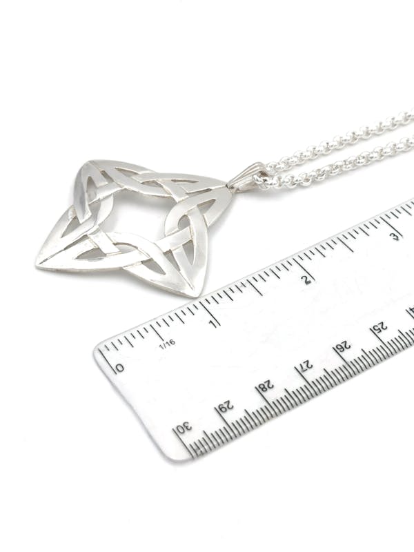 Womens Celtic Knot Necklace in Sterling Silver. Picture For Scale.