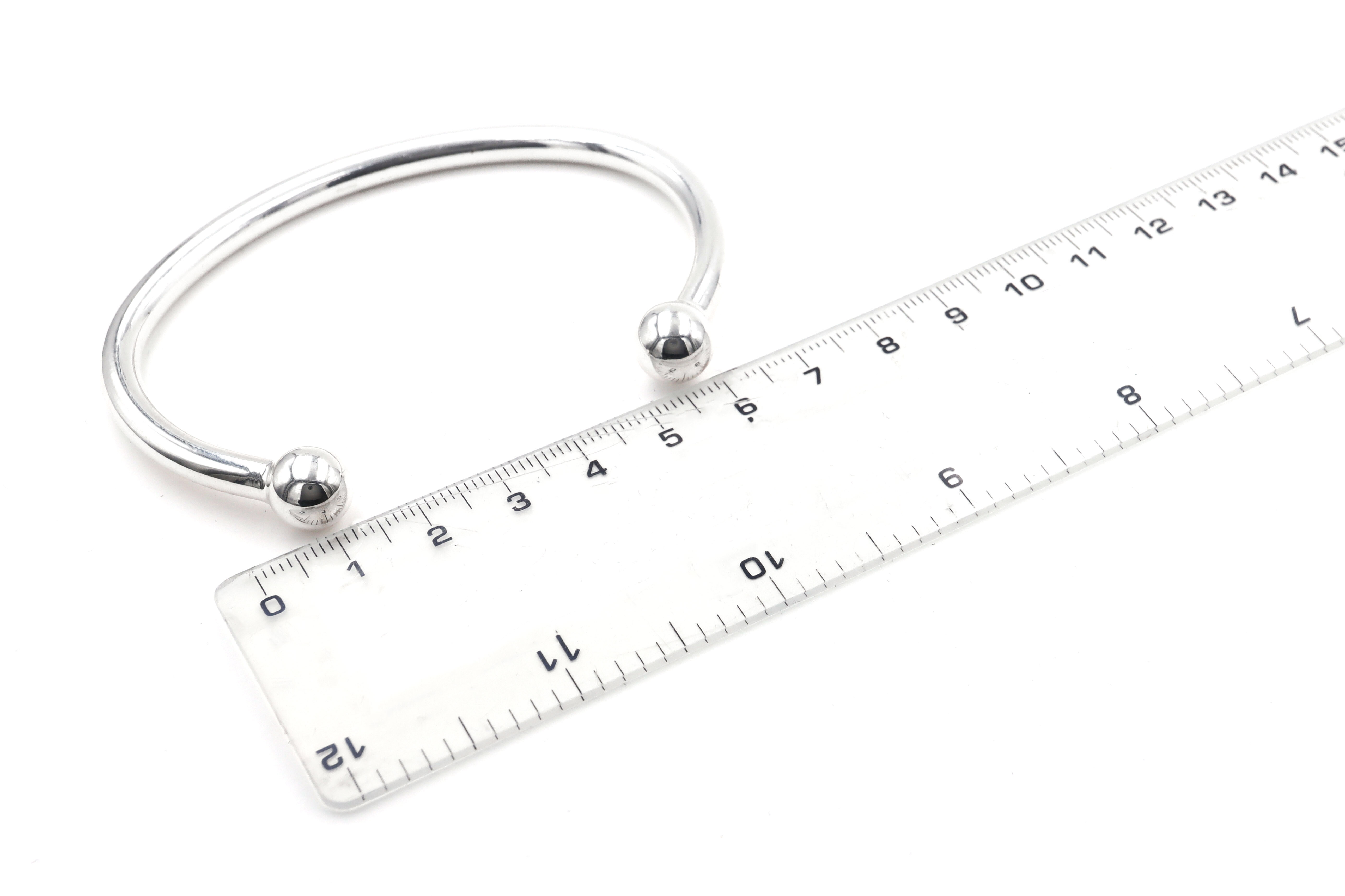 Mens Sterling Silver Gaelic Bangle. Photographed Open.