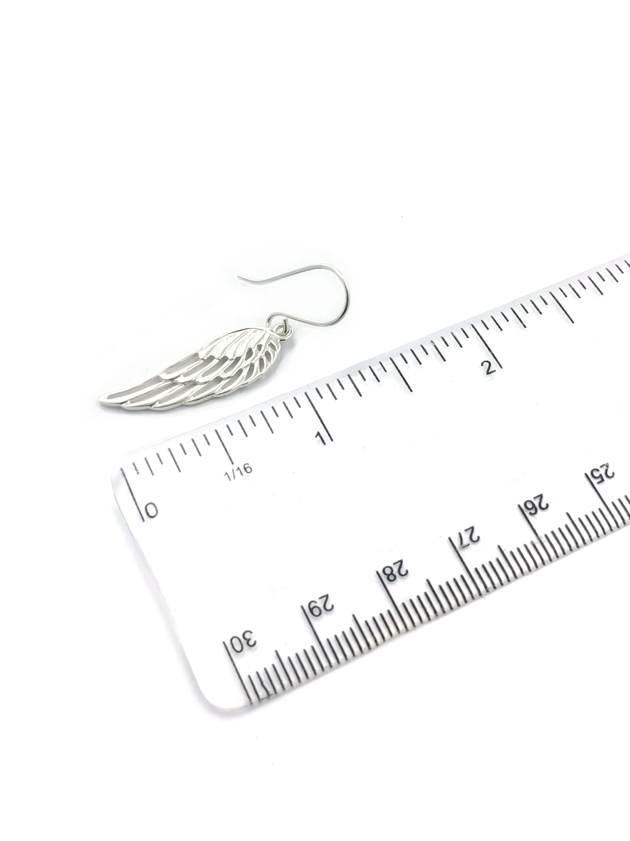 Womens Celtic Knot Earrings in Sterling Silver. Picture For Scale.