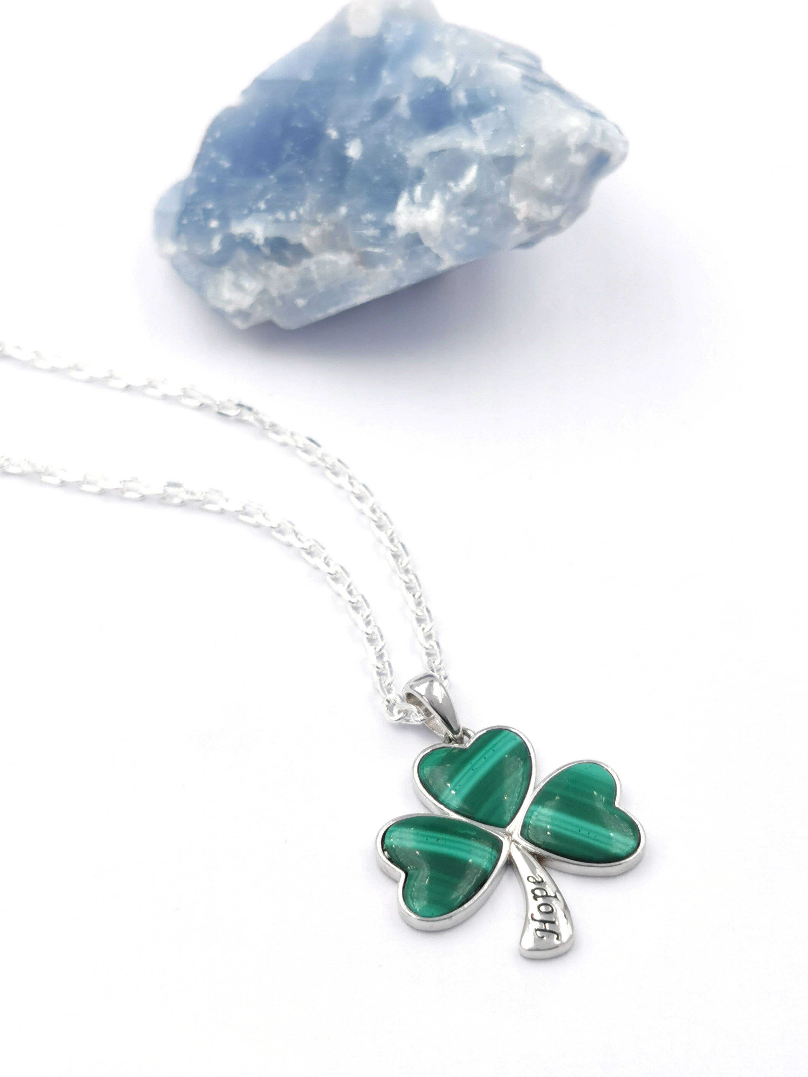 Womens Sterling Silver Shamrock Necklace. Pictured Flat.