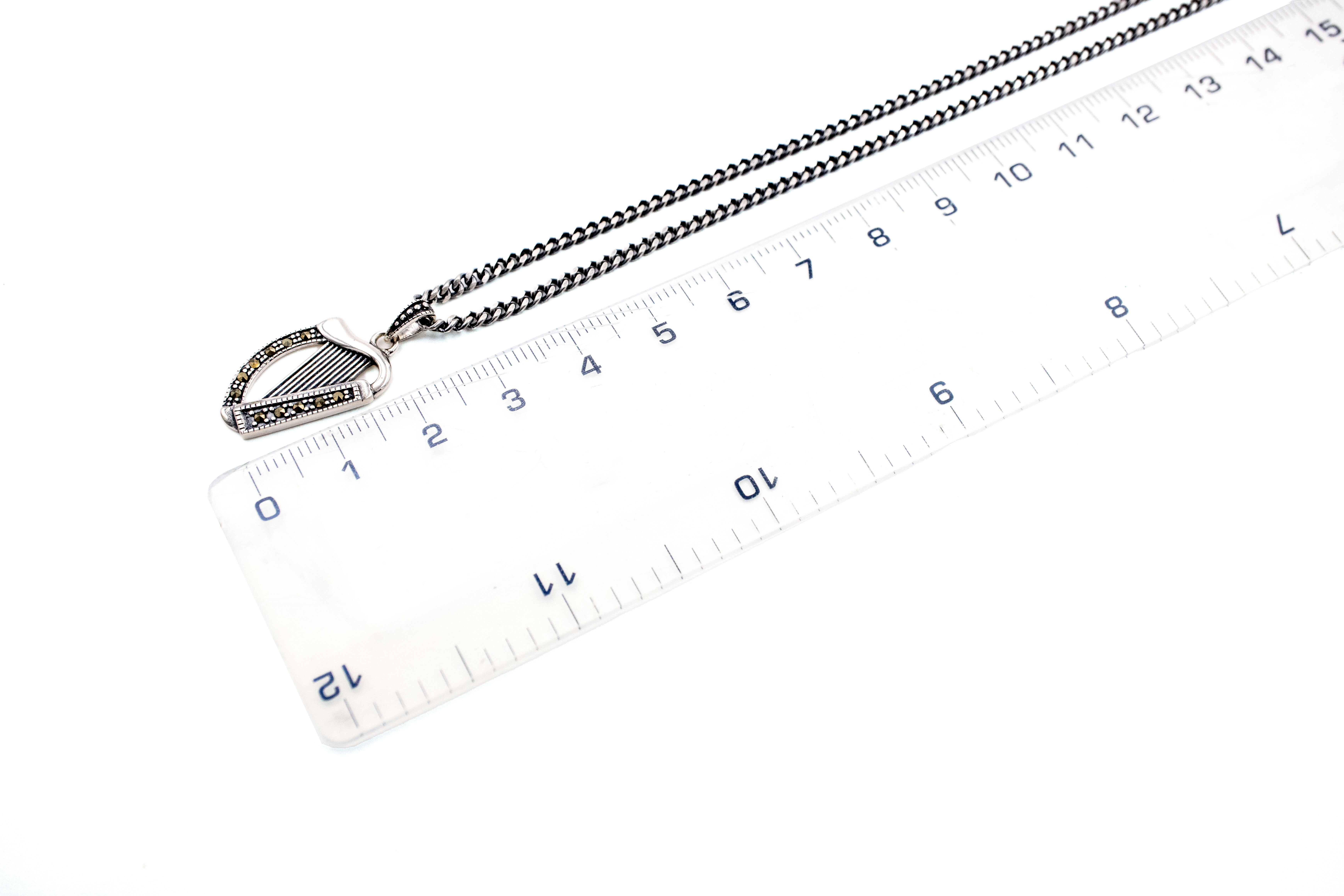 Irish Harp Necklace in Real Sterling Silver. Picture For Scale.