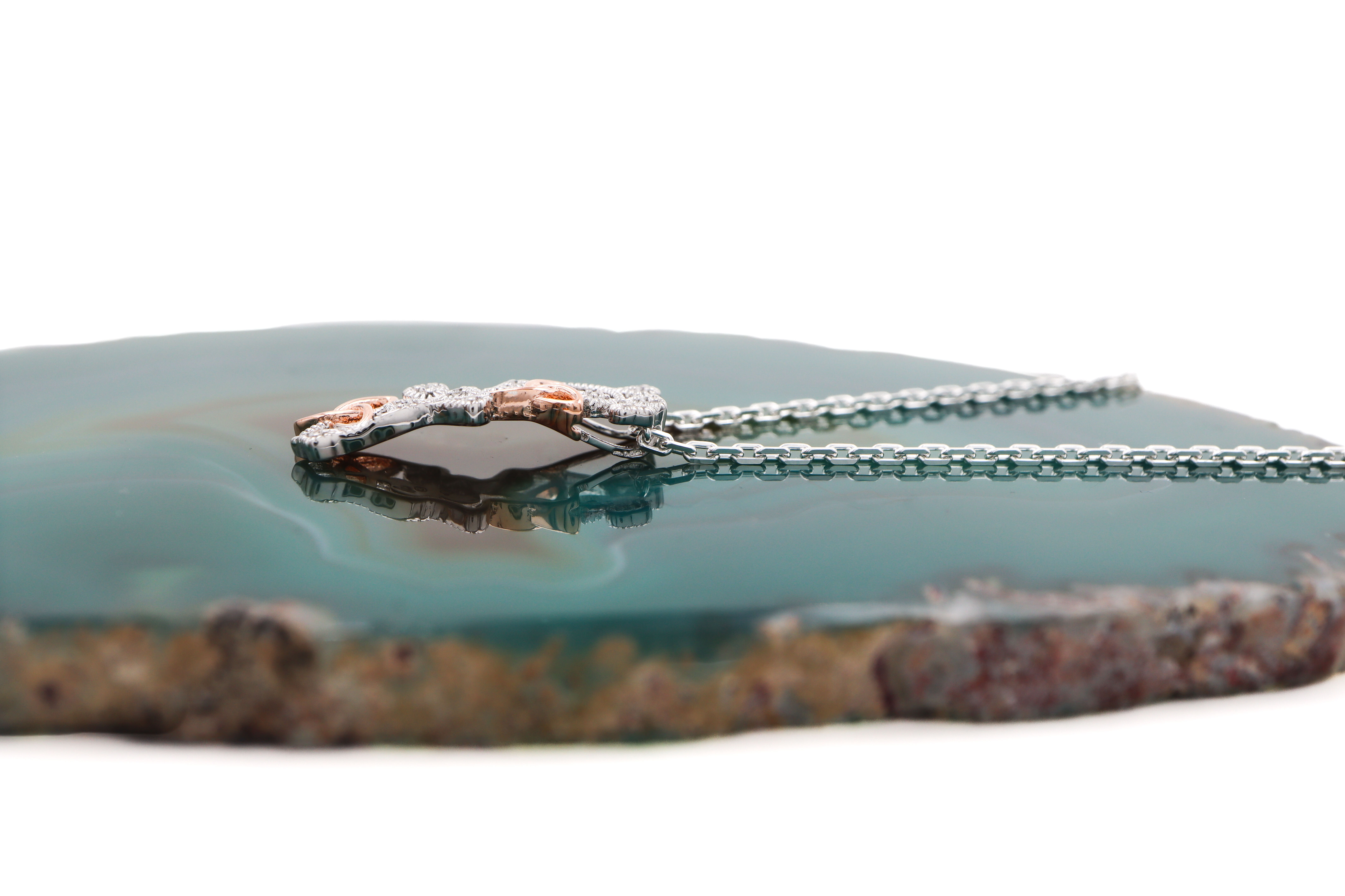 Womens Trinity Knot Necklace in Real Sterling Silver. Side View.