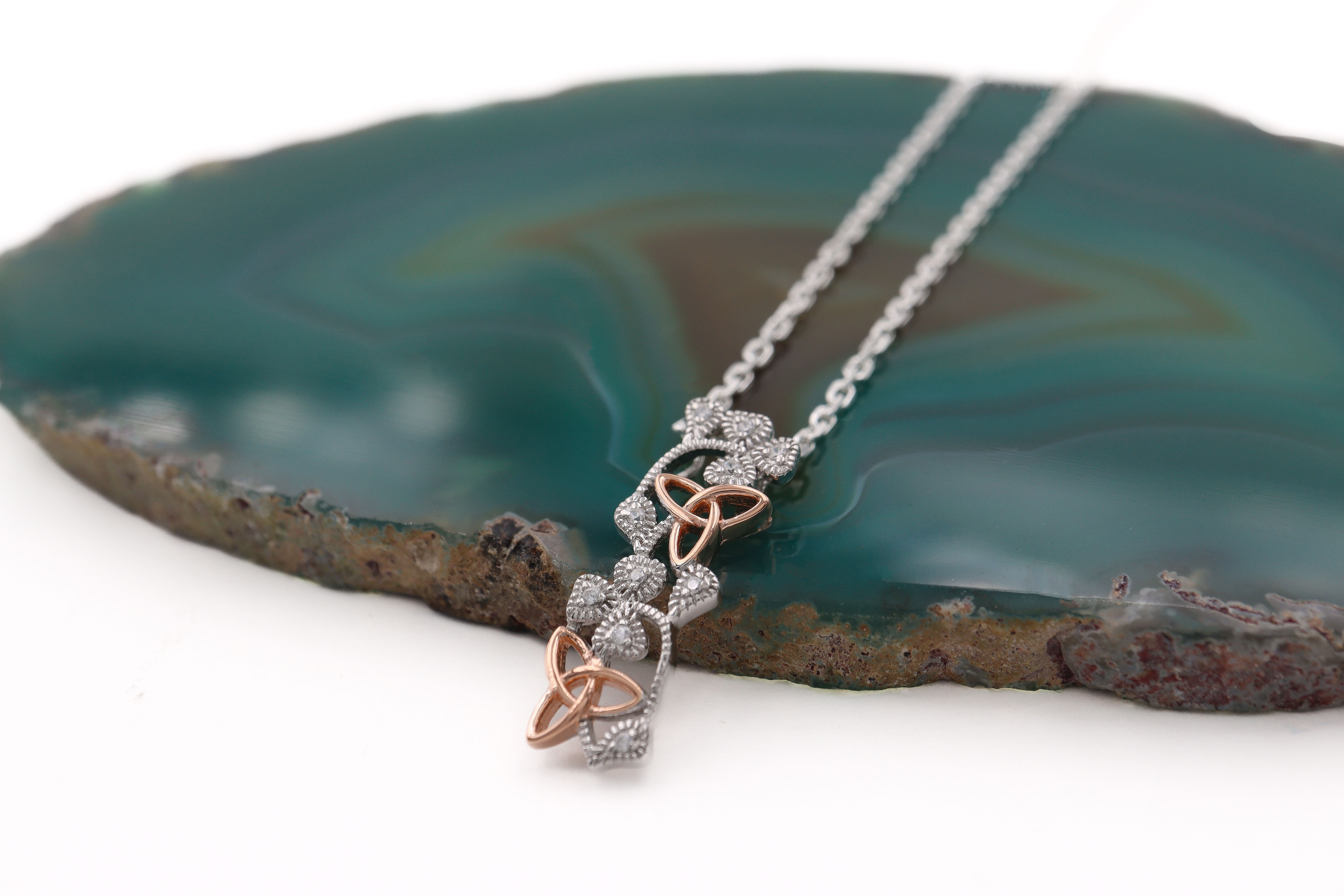 Gorgeous Sterling Silver Trinity Knot & Shamrock Necklace For Women. Side View.