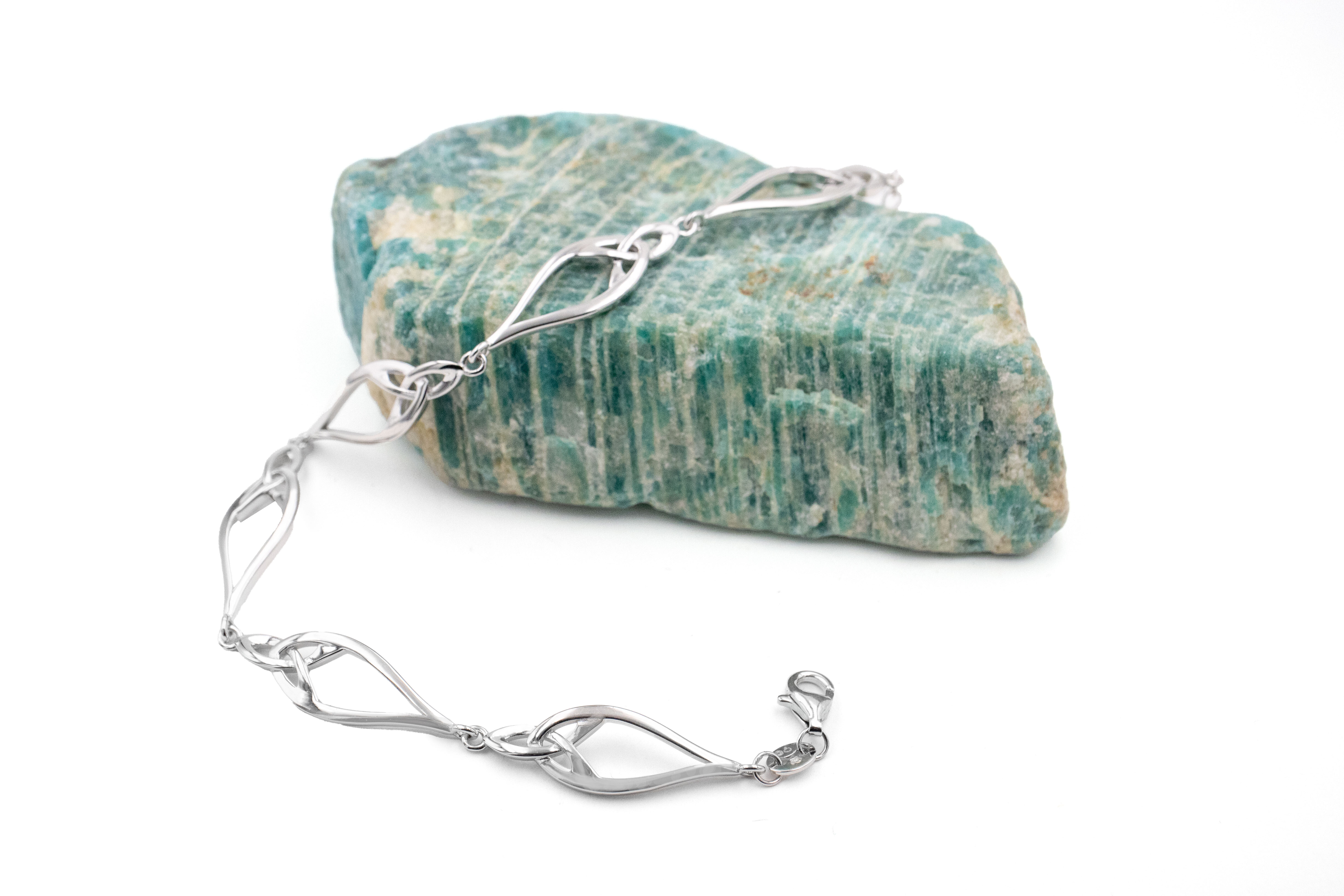 Real Sterling Silver Trinity Knot Bracelet For Women. Photographed Open.