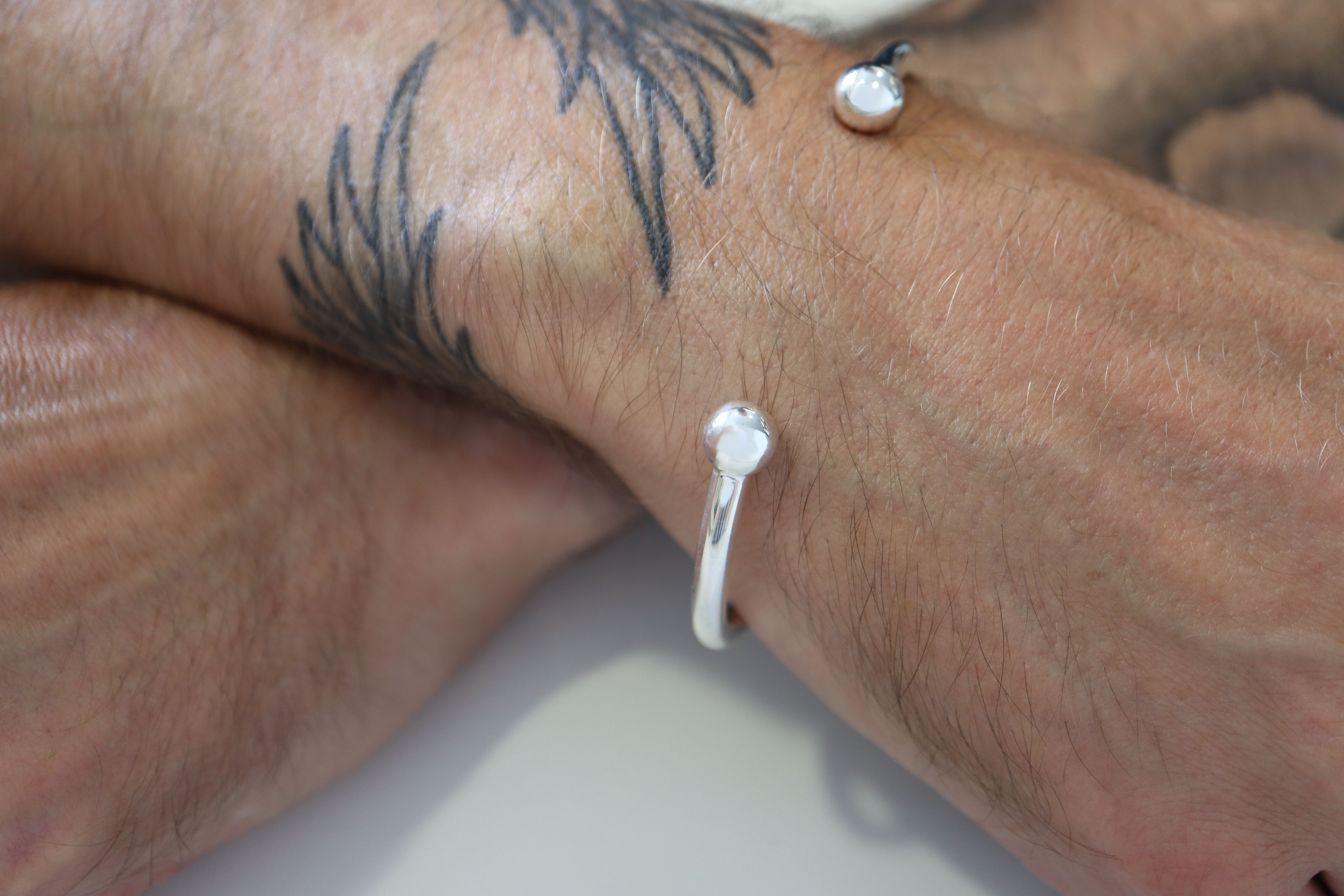 Gaelic Bangle in Sterling Silver - Model Photo