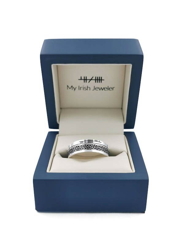 Ogham & Trinity Knot Ring in Sterling Silver With a Oxidized Finish. In Luxury Packaging.