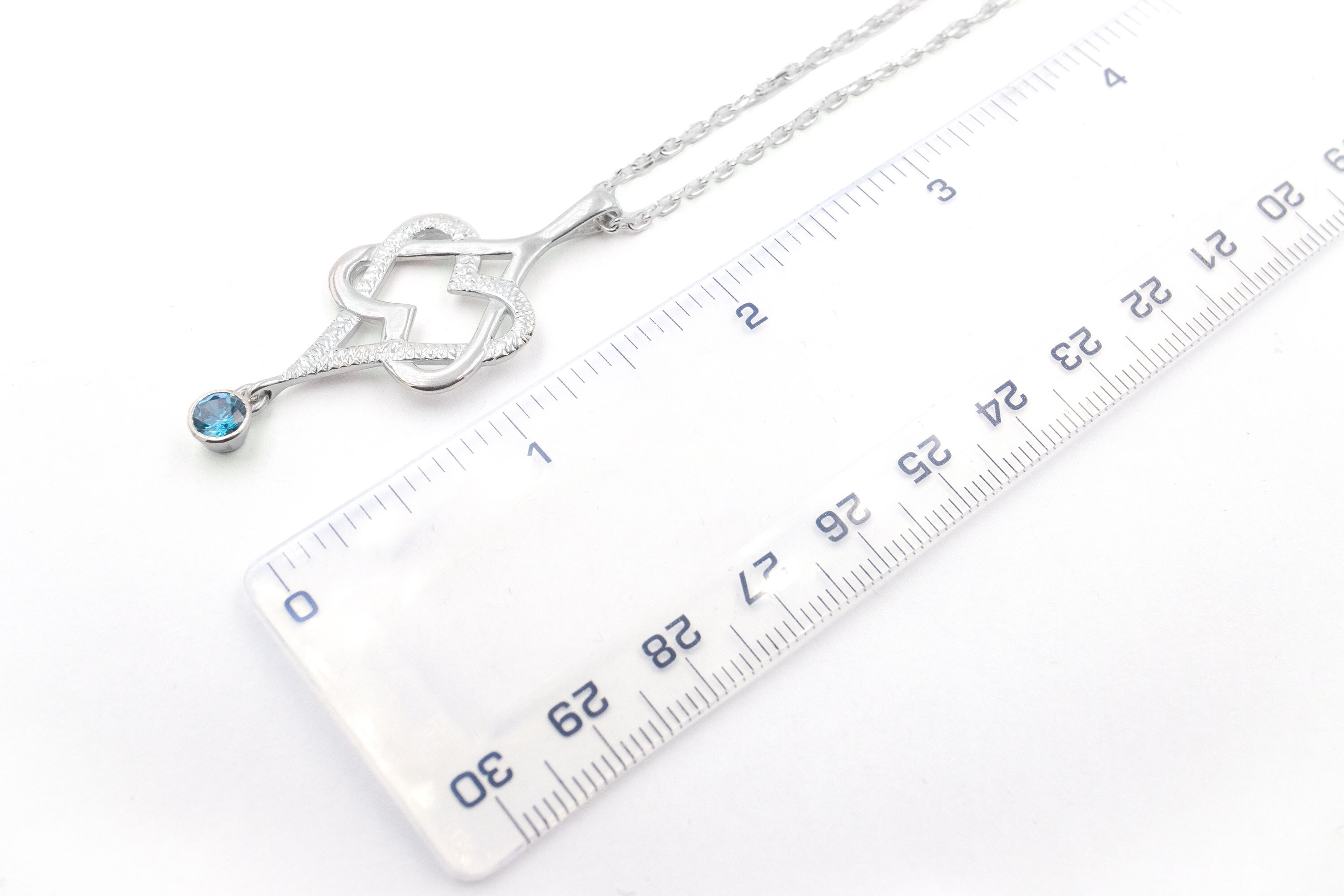 Attractive Sterling Silver Celtic Knot Necklace For Women. Picture For Scale.