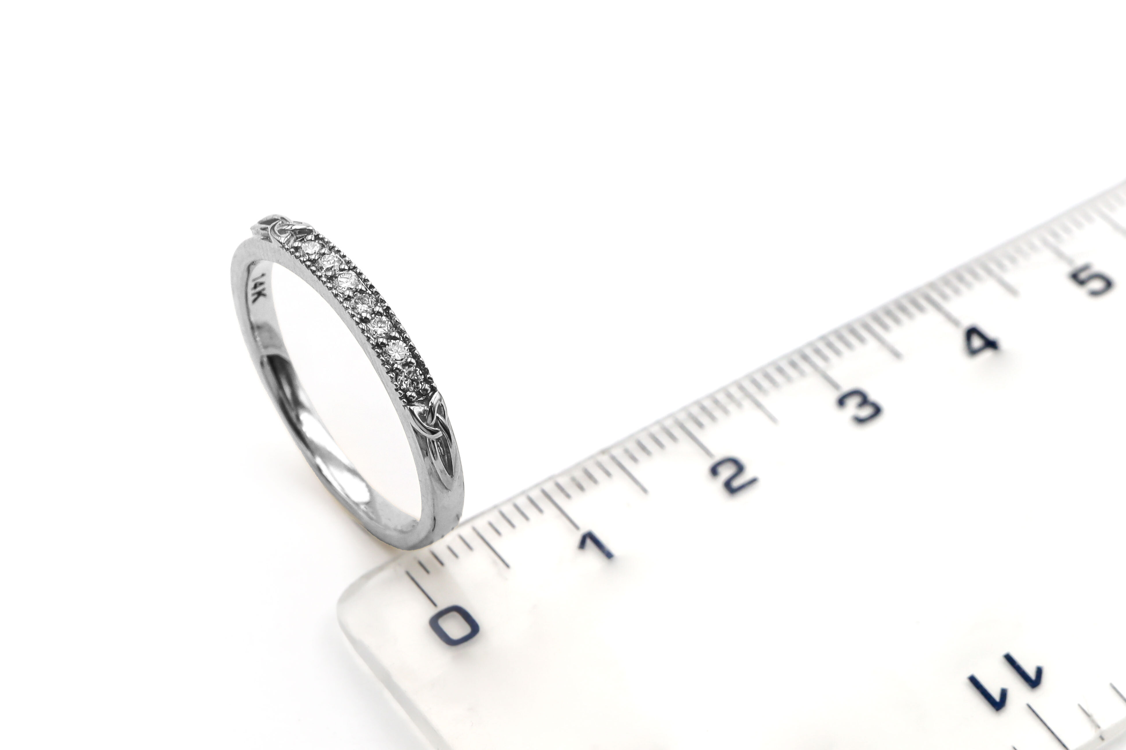 Attractive Platinum 950 Trinity Knot 2.0mm Ring With a Polished Finish For Women. Picture For Scale.