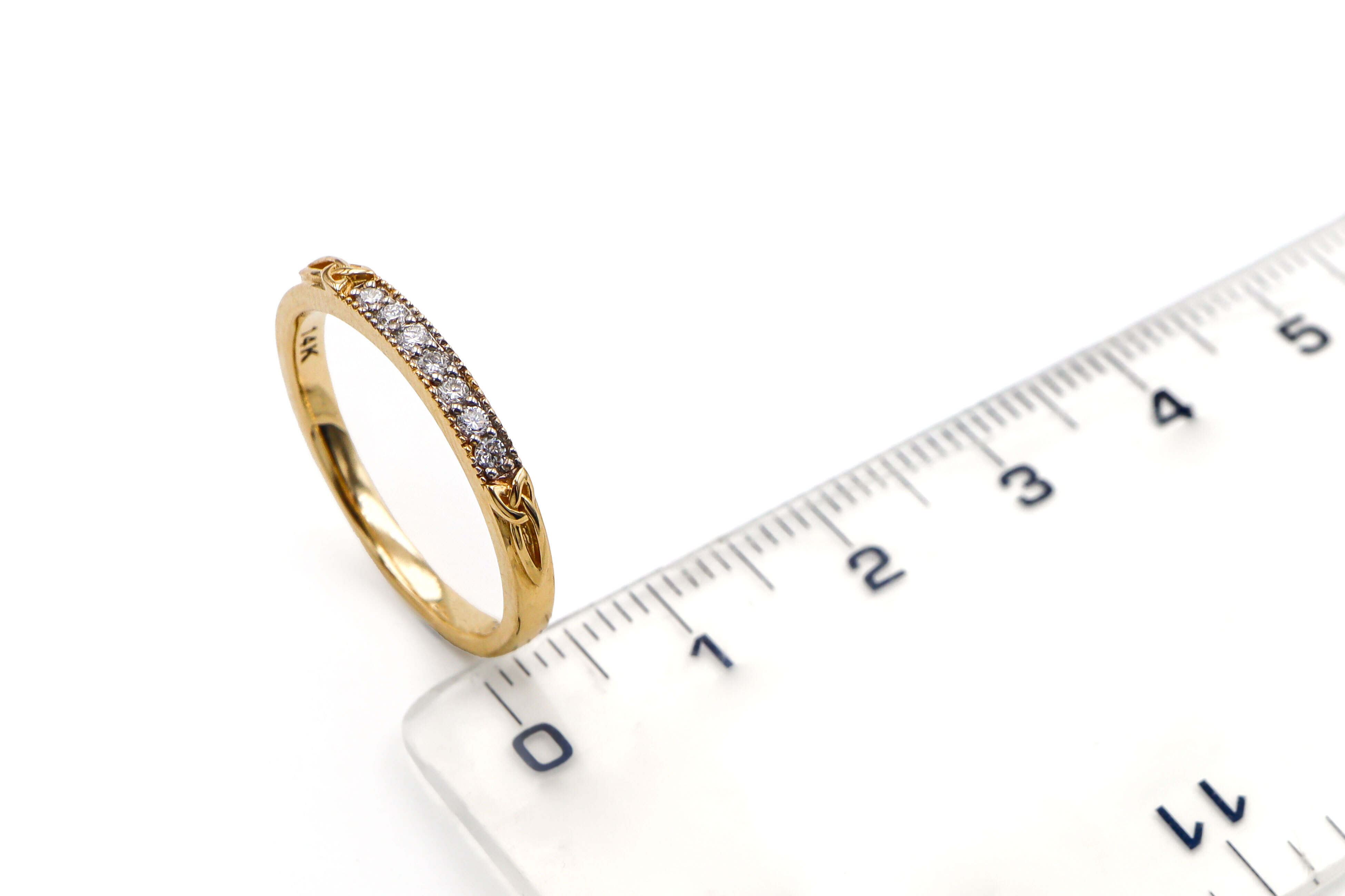 Womens Polished Trinity Knot 2.0mm Ring in Real 14K Yellow Gold. Picture For Scale.
