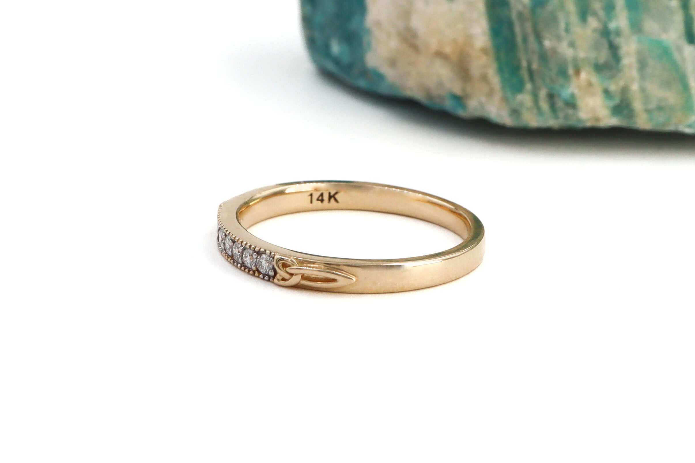 Womens Polished Trinity Knot 2.0mm Ring in Real 14K Yellow Gold. Side View.