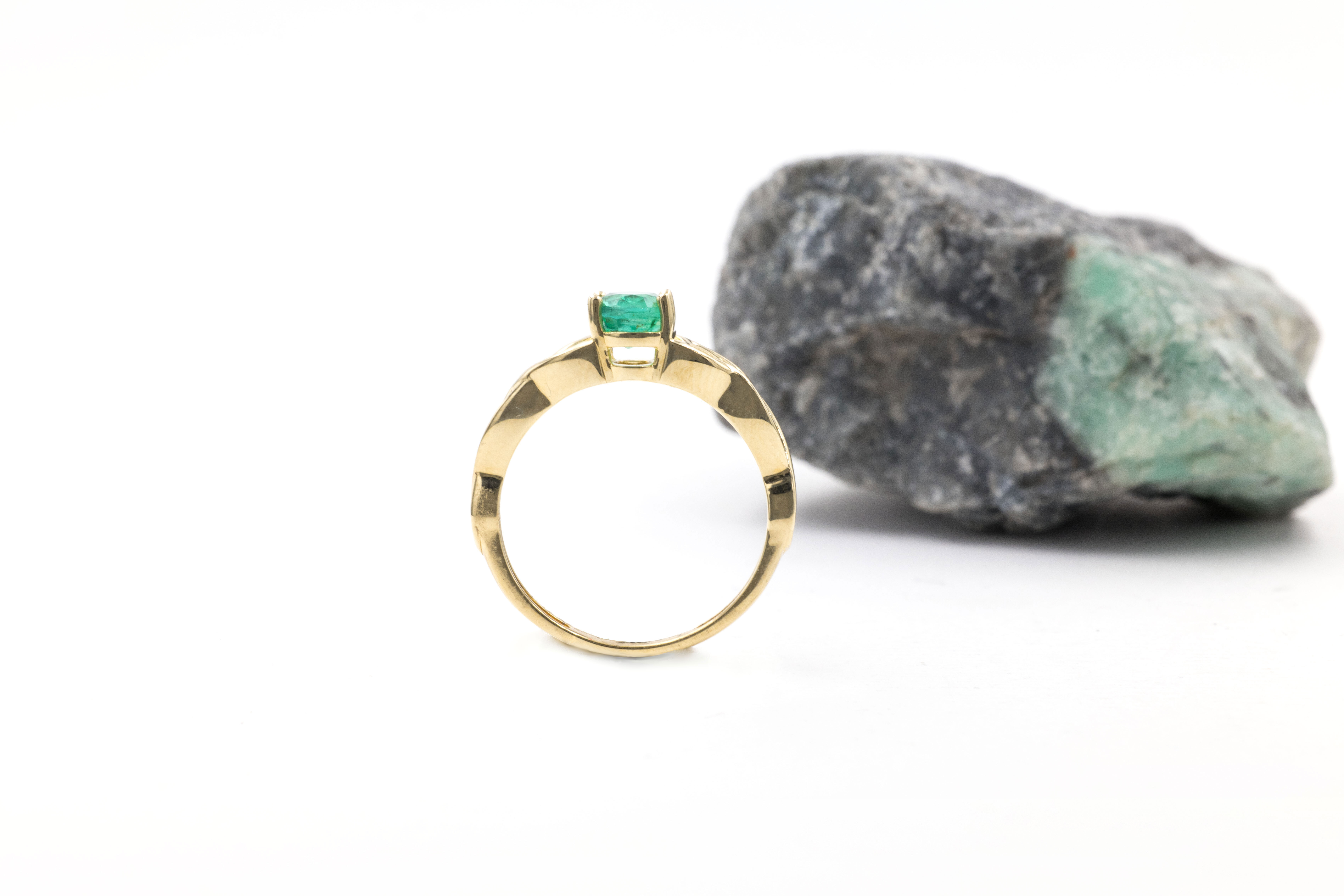 Womens Trinity Knot 0.70ct Natural Emerald Engagement Ring in 14K Yellow Gold With a Polished Finish