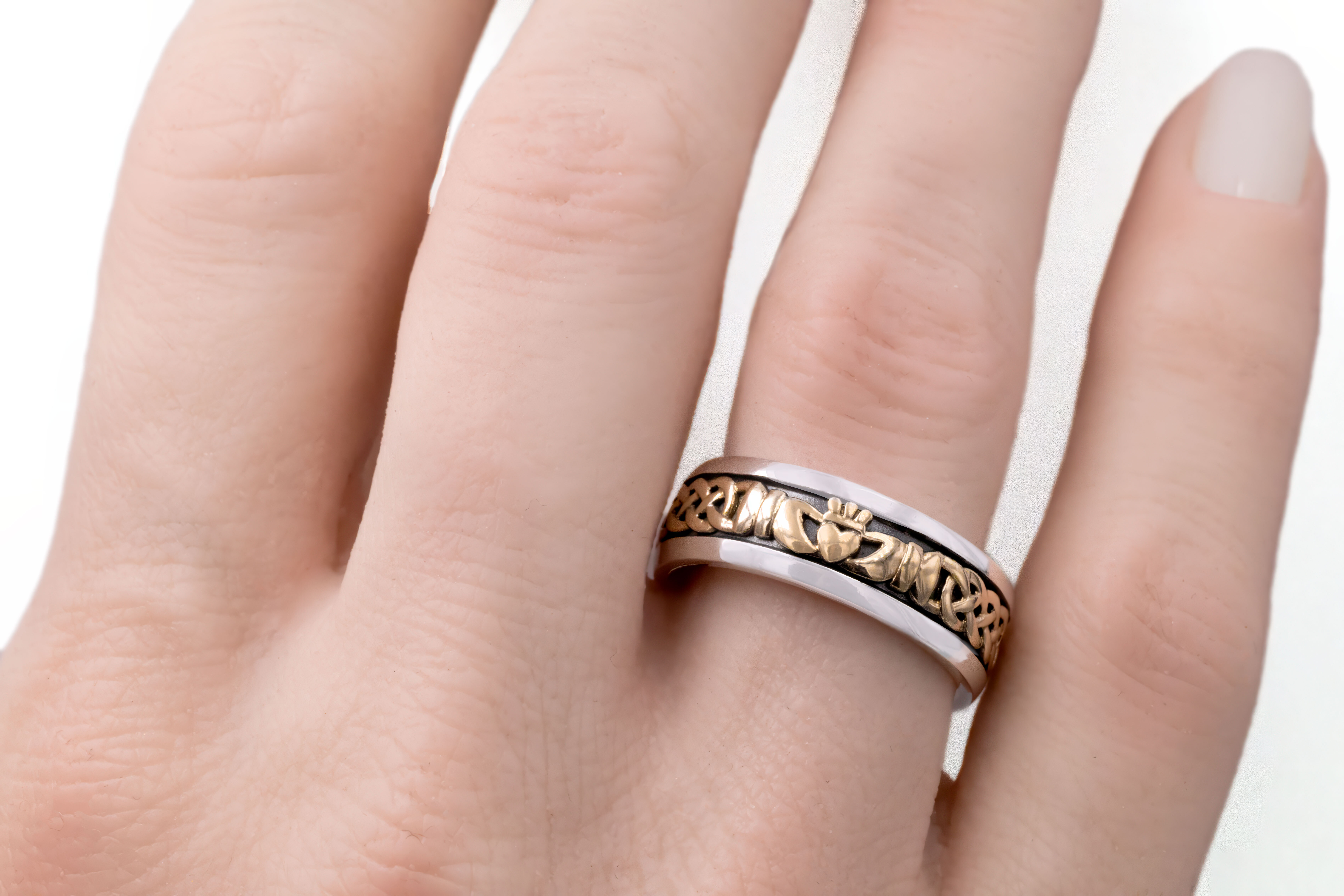 Mens Attractive Sterling Silver & 10K Yellow Gold Claddagh & Celtic Knot 7.5mm Ring - Model Photo