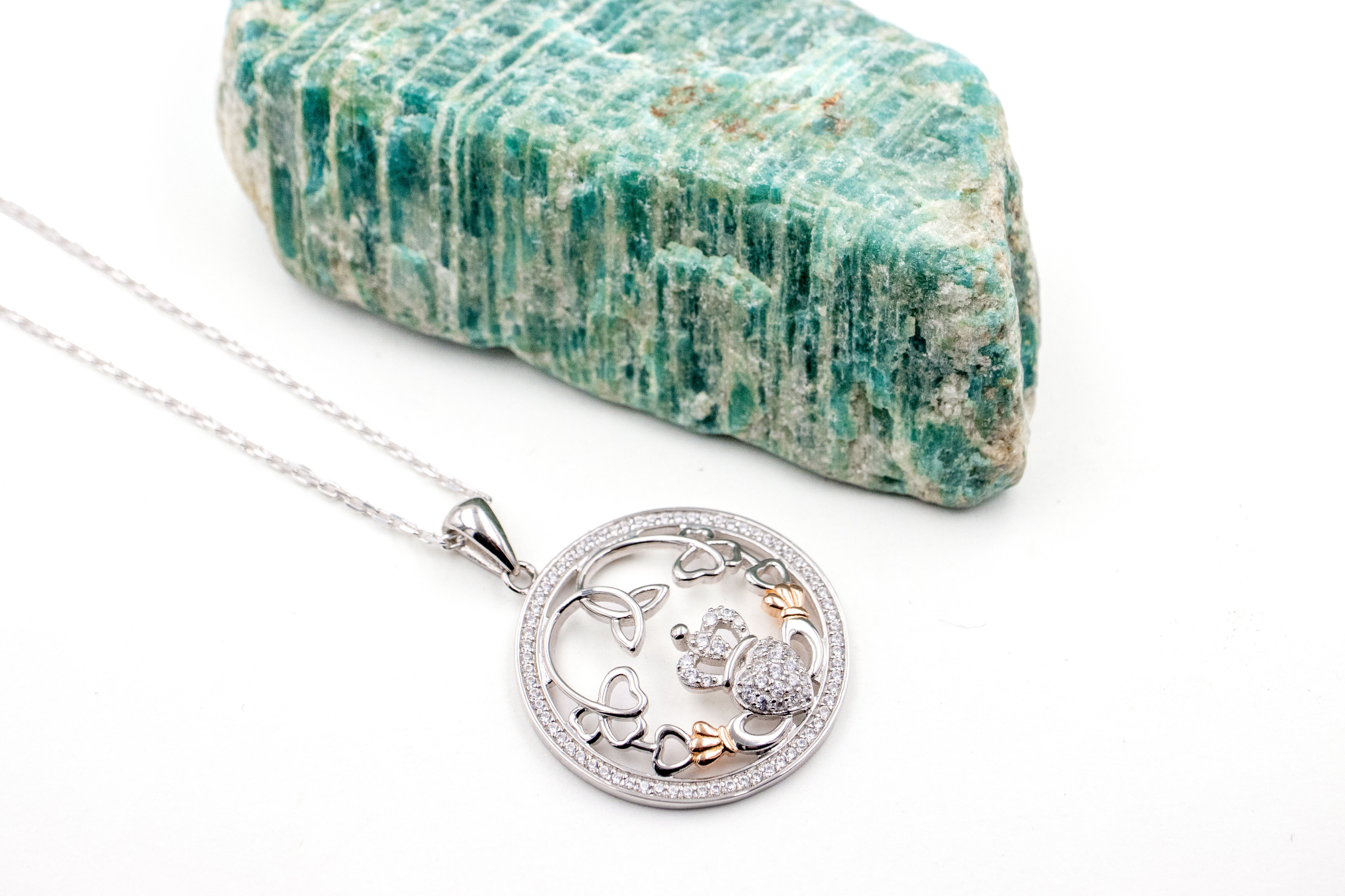 Irish Sterling Silver Claddagh Gift Set With a Polished Finish For Women. Pictured Flat.