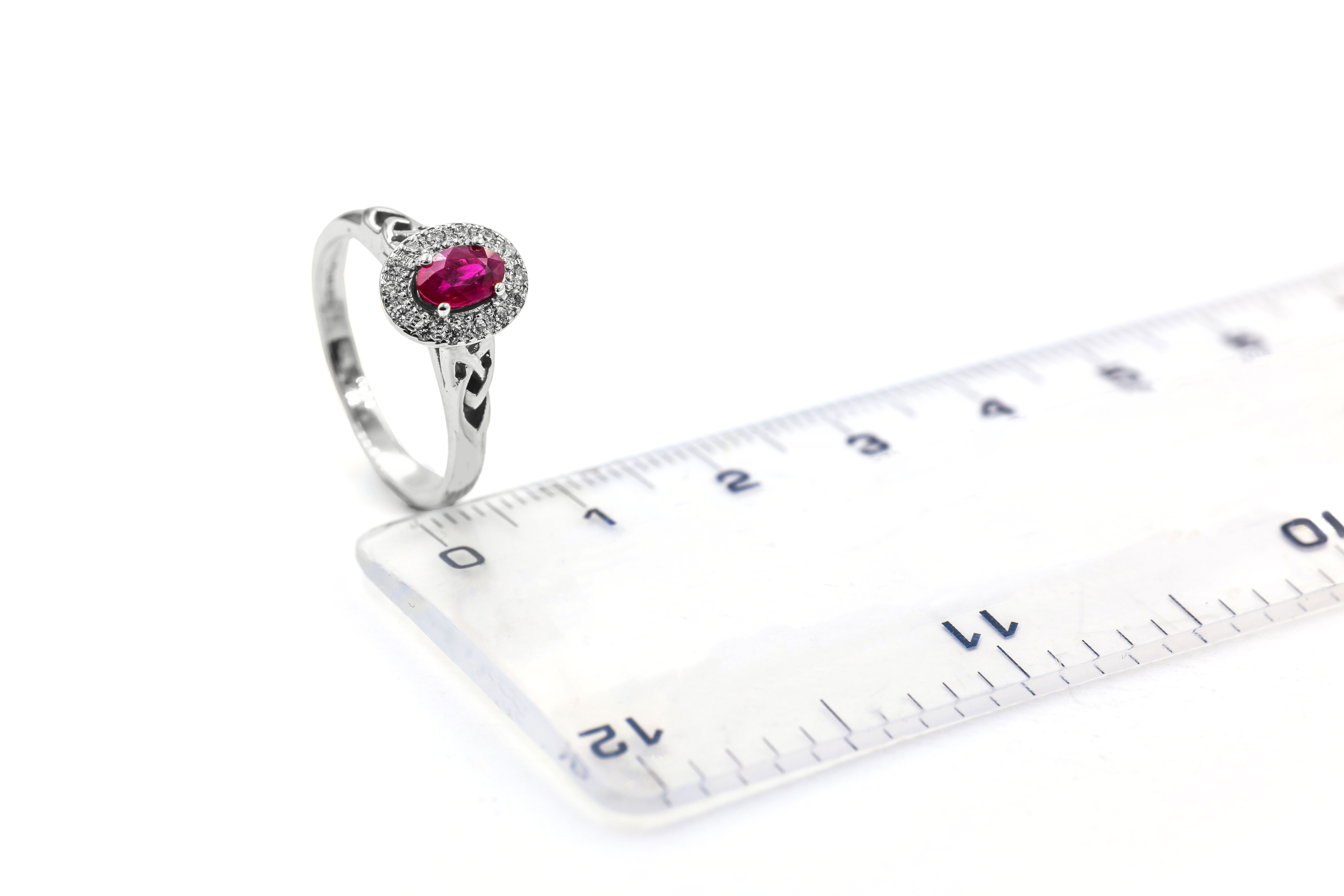 Womens Trinity Knot & Celtic Knot Ring in White Gold. Picture For Scale.