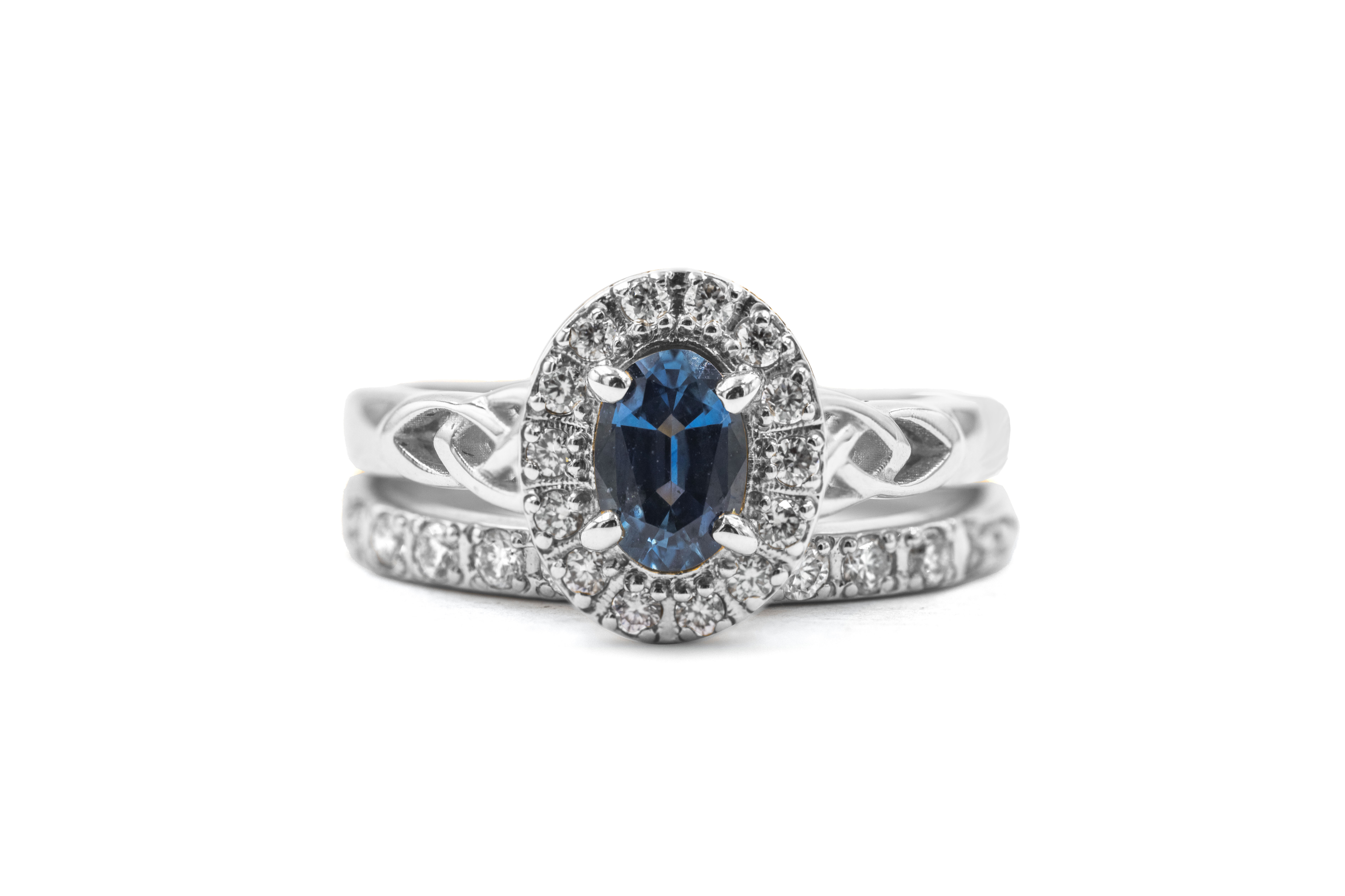 Oval Halo Trinity Knot Ring