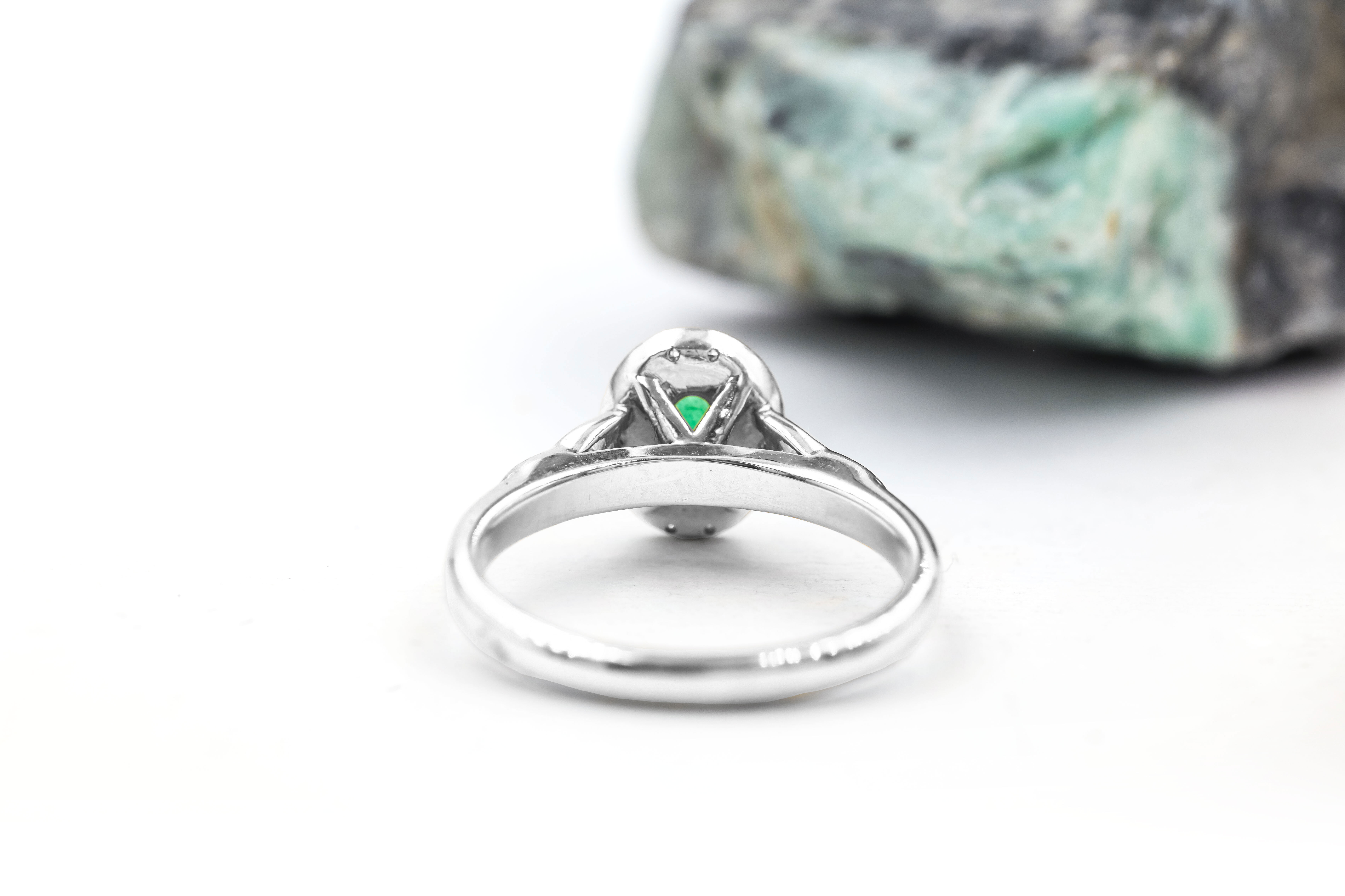 Gorgeous Platinum 950 Trinity Knot 0.50ct Natural Emerald Engagement Ring With a Polished Finish For Women. Picture Of The Back.