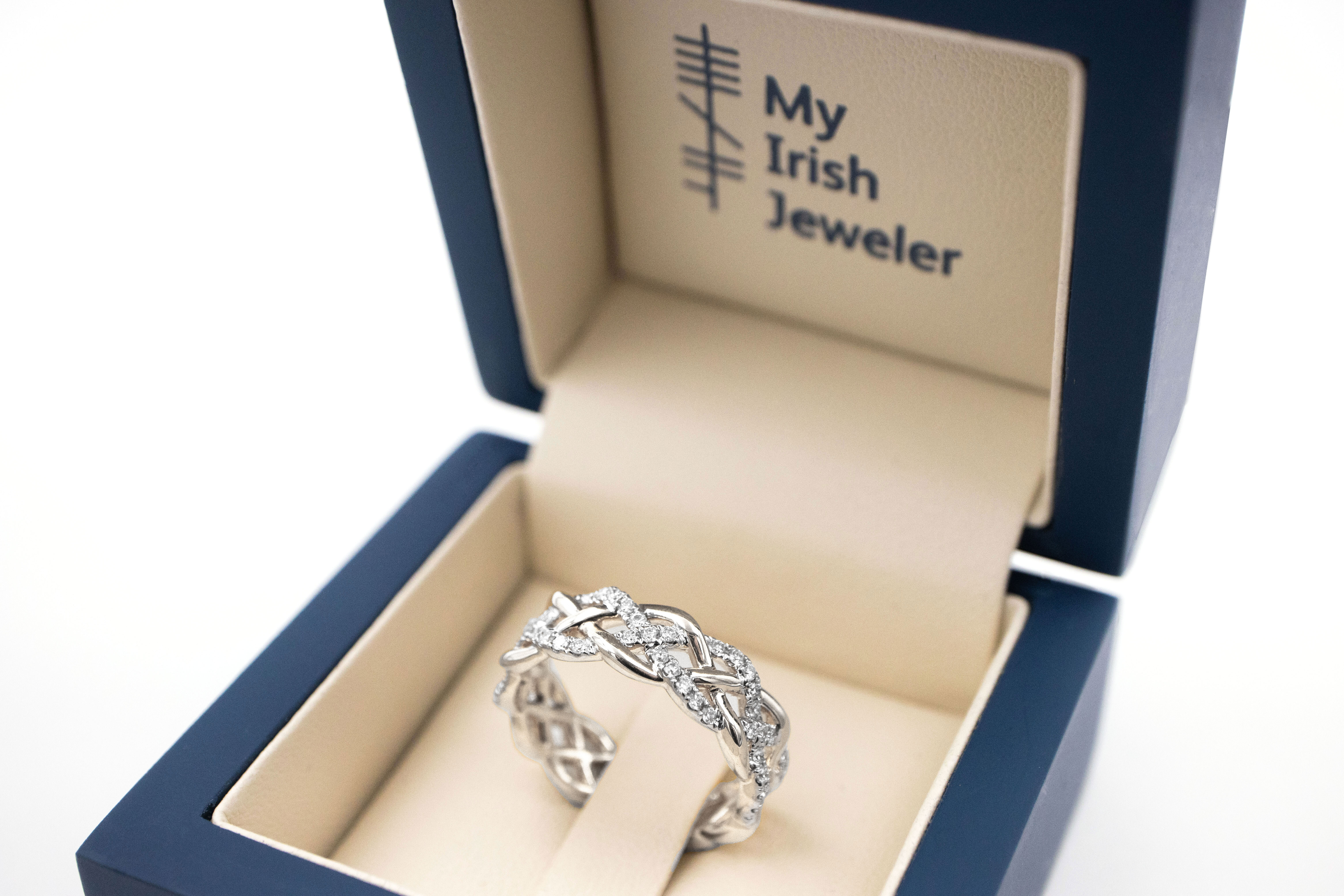 Authentic White Gold Celtic Knot Ring For Women With a Polished Finish. In Luxury Packaging.
