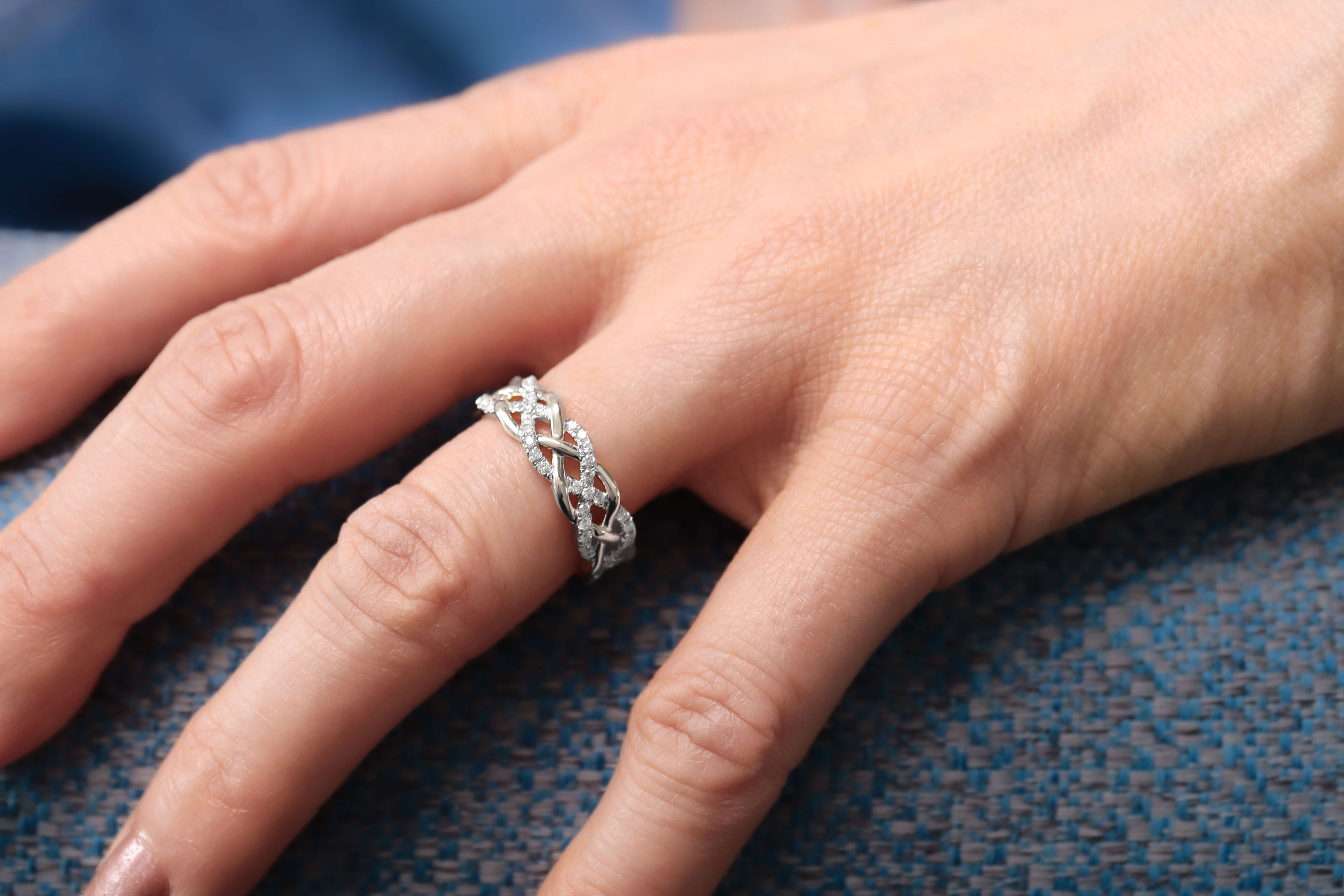 Authentic White Gold Celtic Knot Ring For Women With a Polished Finish - Model Photo