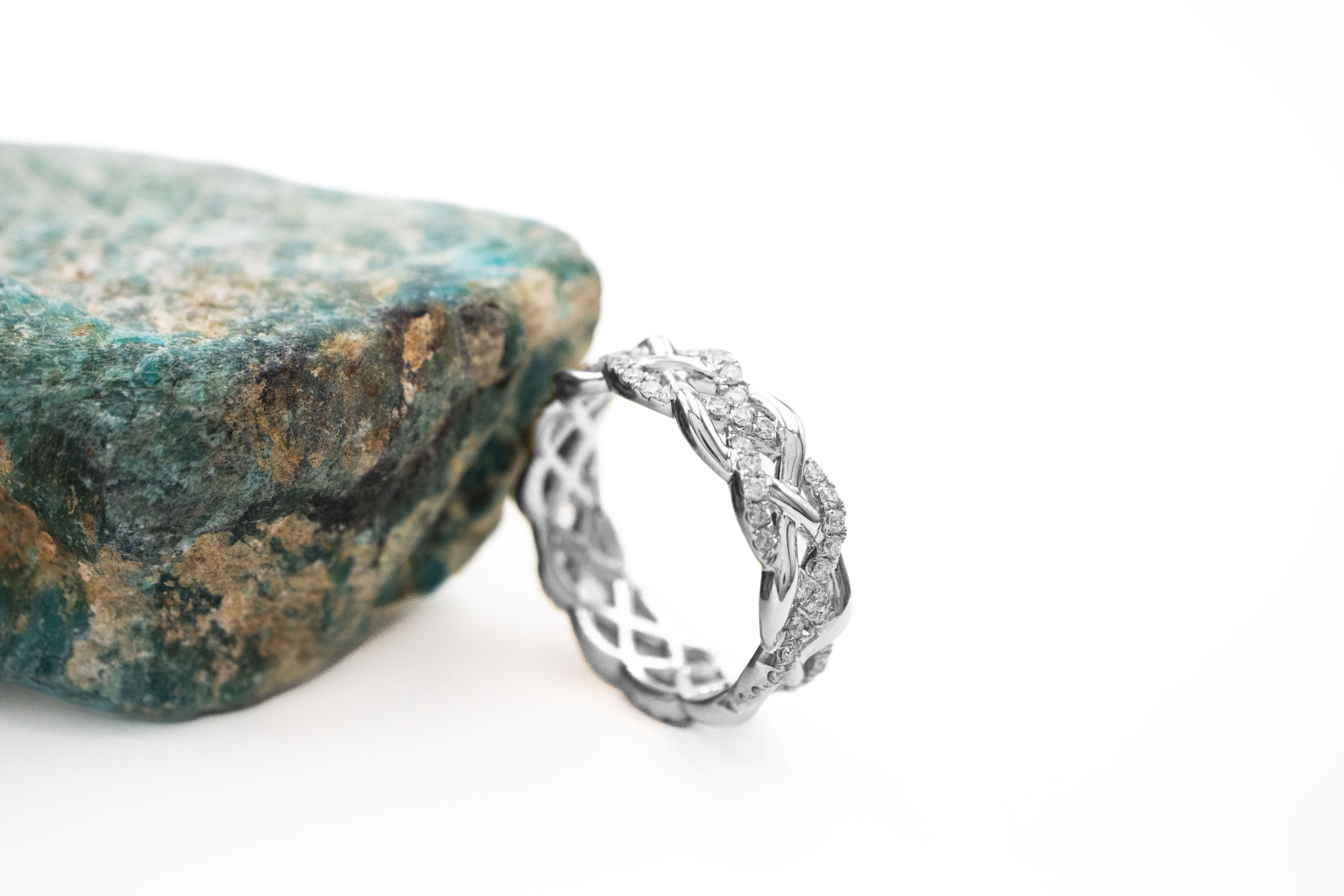 Striking White Gold Celtic Knot 5.0mm Ring With a Polished Finish For Women. Side View.