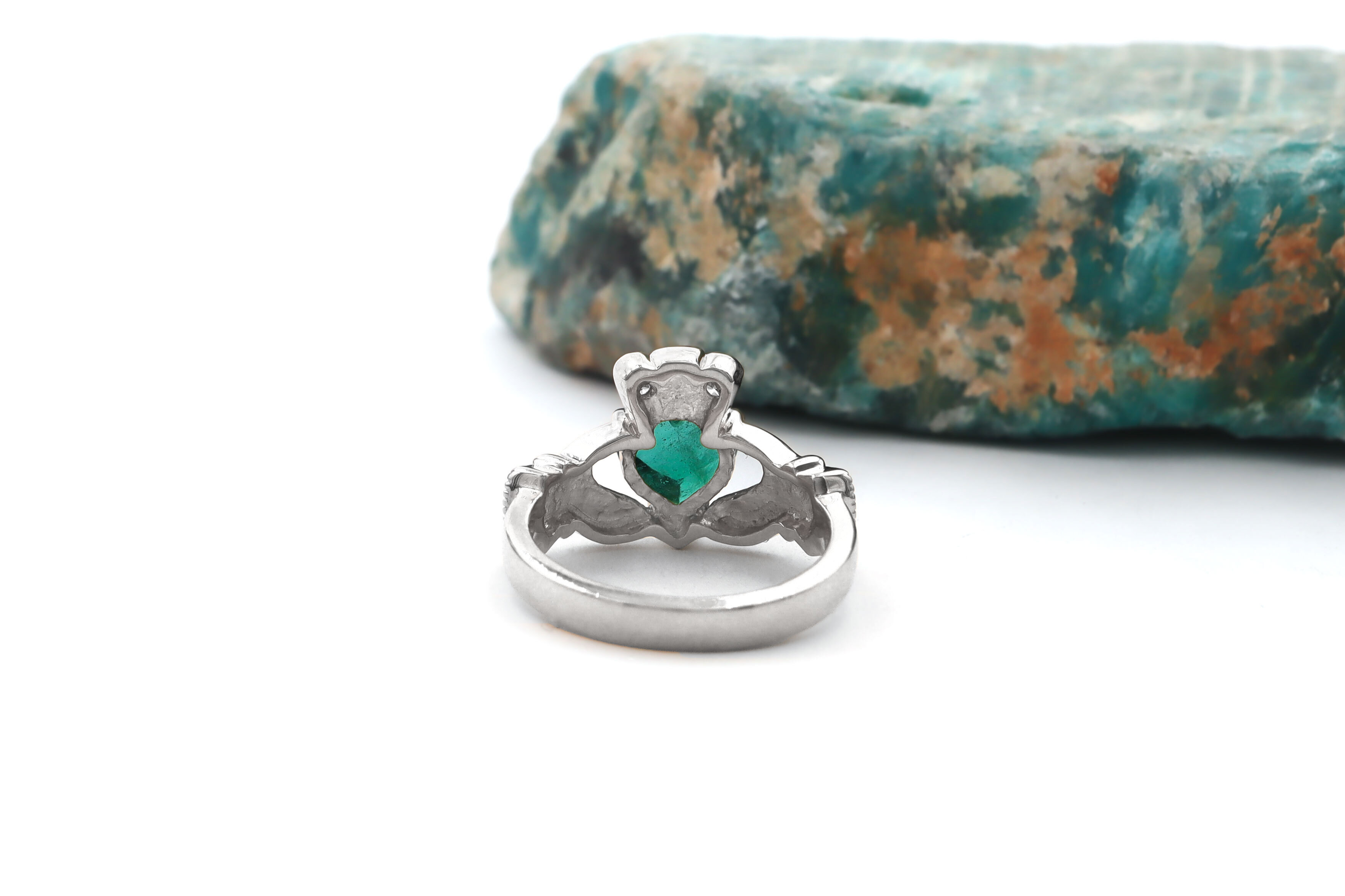 Genuine Platinum Claddagh 1.00ct Natural Emerald Ring With a Polished Finish For Women. Picture Of The Back.