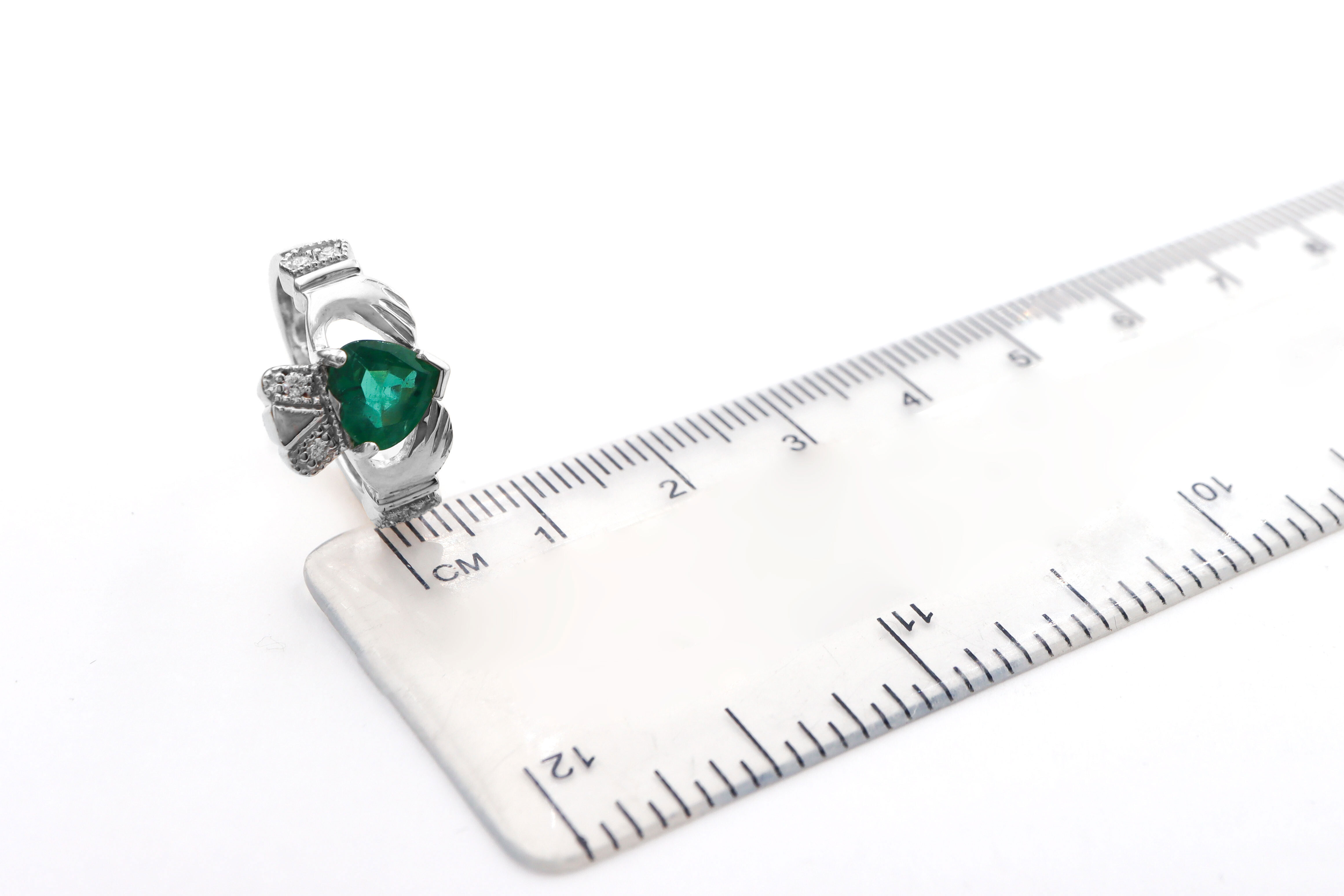 Womens Striking Polished Platinum Claddagh 2.0mm Ring. Picture For Scale.
