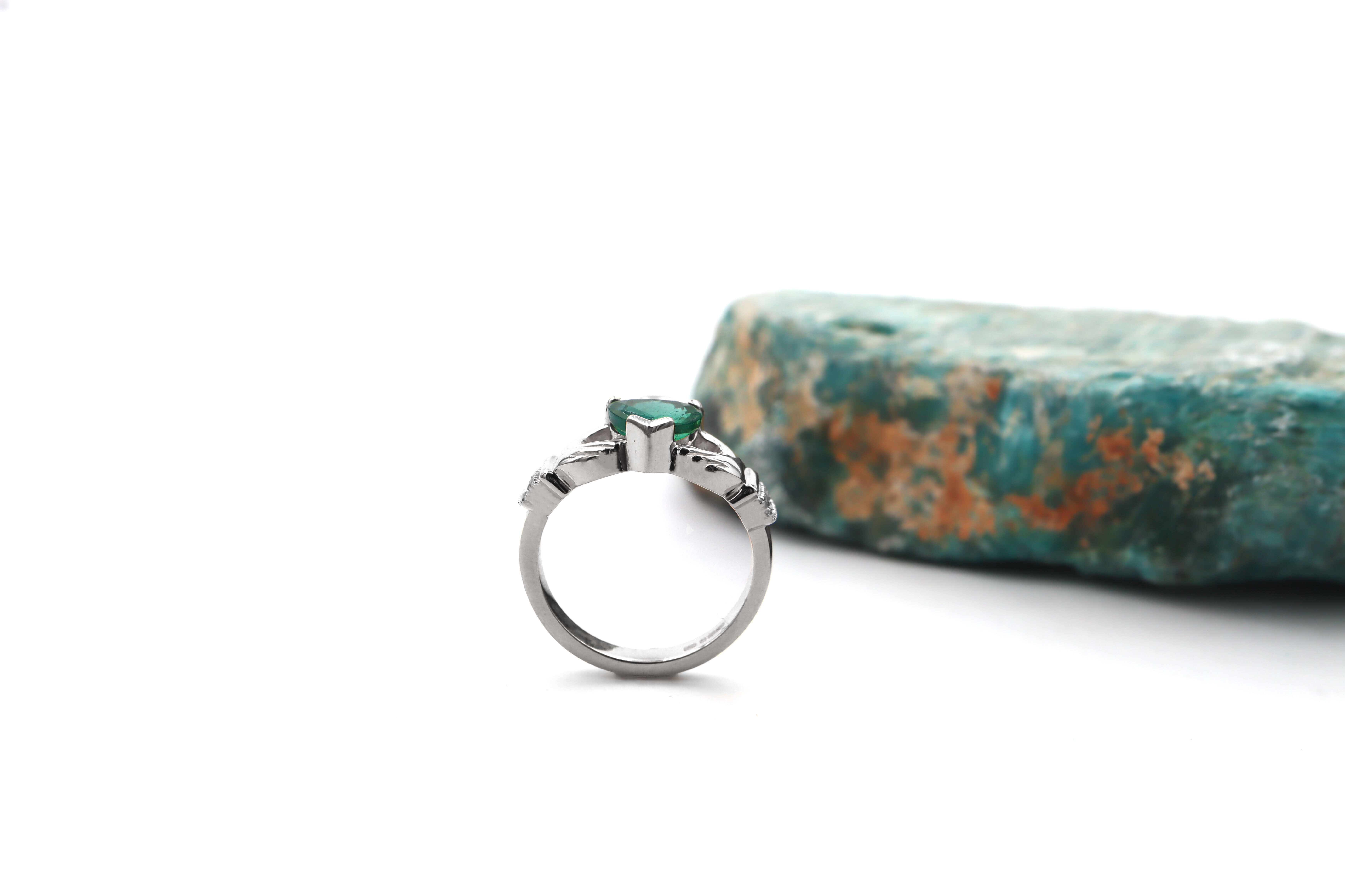 Irish Platinum Claddagh Engagement Ring For Women With a Polished Finish. Side View.