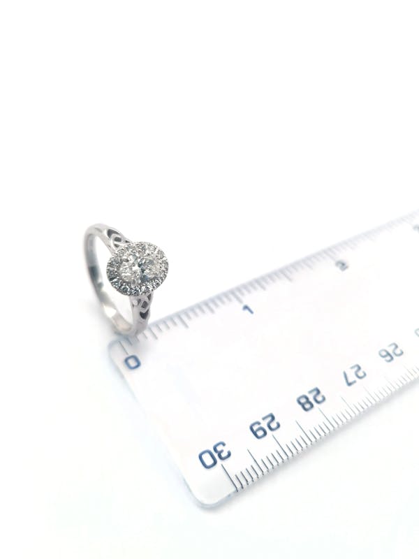 Womens Trinity Knot 0.50ct Lab Grown Diamond Engagement Ring in Real Platinum 950. Picture For Scale.